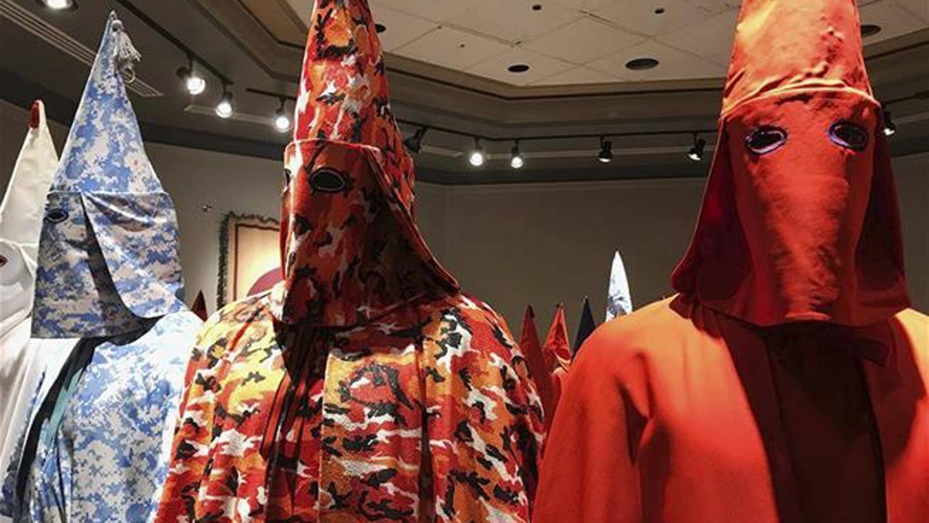 KKK robes are on display as part of Baltimore artist Paul Rucker’s installation entitled “Rewind,” now installed at York College’s Wolf Hall in York, Pa. The college barred the public from seeing the art exhibition on slavery, white supremacy and racist violence against blacks, deeming it “potentially disturbing to some.” (The Associated Press)