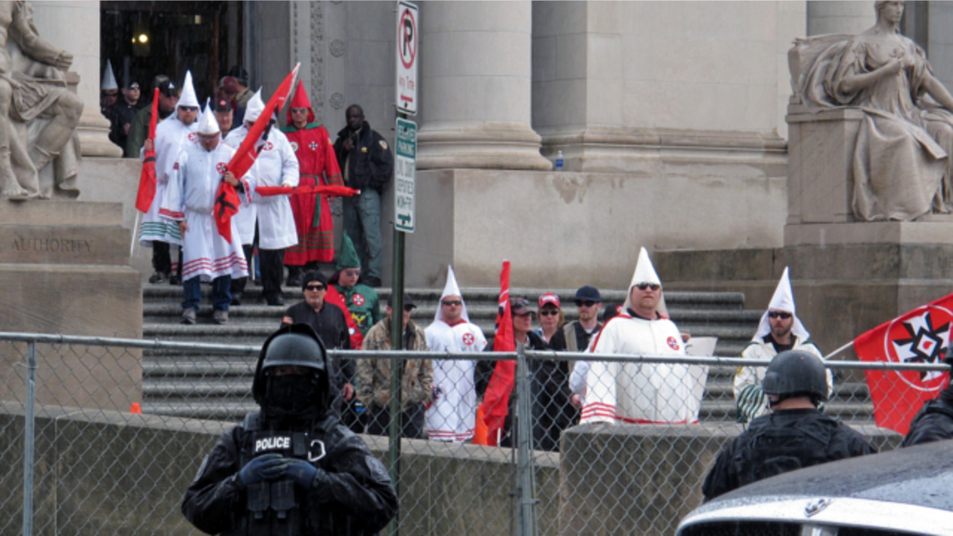 March 30, 2013: Ku Klux Klan members gather for a protest outside a courthouse in Memphis, Tenn.
