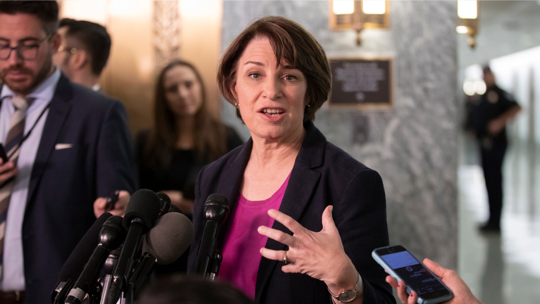 Sen. Amy Klobuchar, D-Minn., a member of the Senate Judiciary Committee, speaks to reporters during a break from testimony by Christine Blasey Ford on Capitol Hill in Washington, Thursday, Sept. 27, 2018. (AP Photo/J. Scott Applewhite)