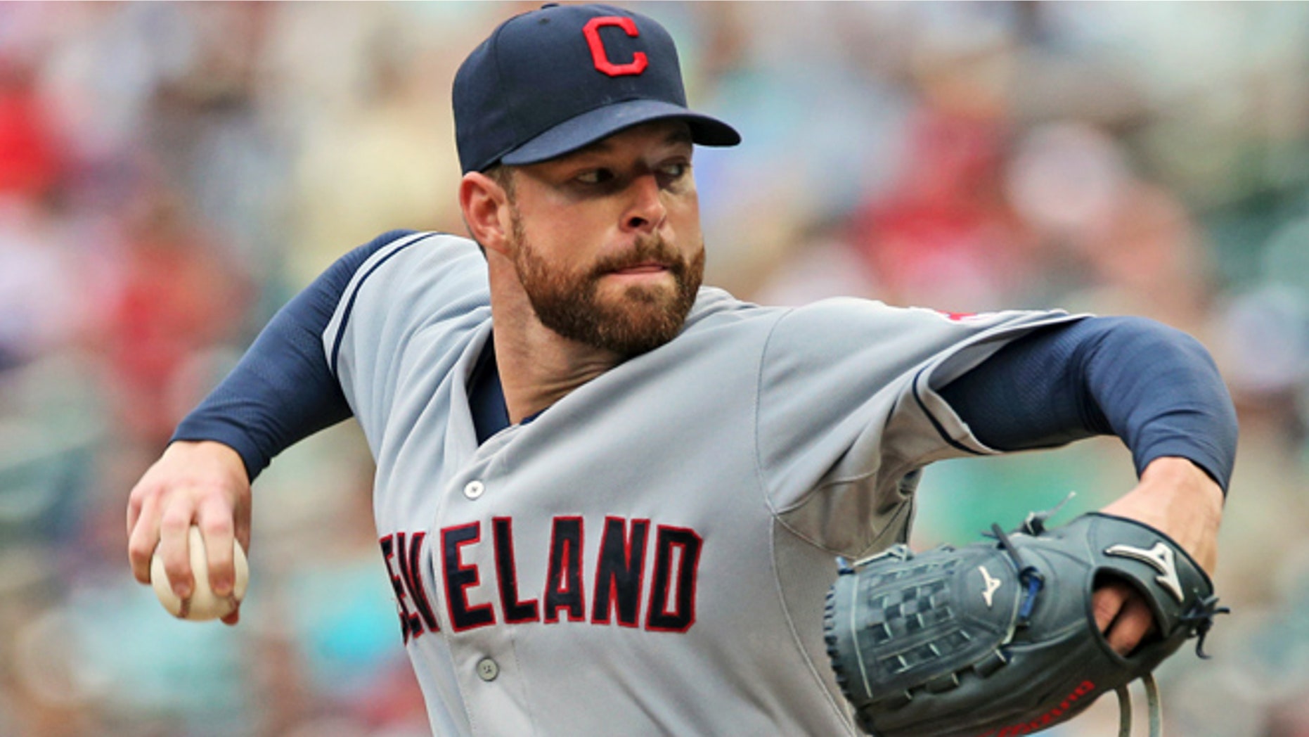 Aug. 21, 2014: Cleveland Indians pitcher Corey Kluber throws against the Minnesota Twins during a baseball game in Minneapolis.