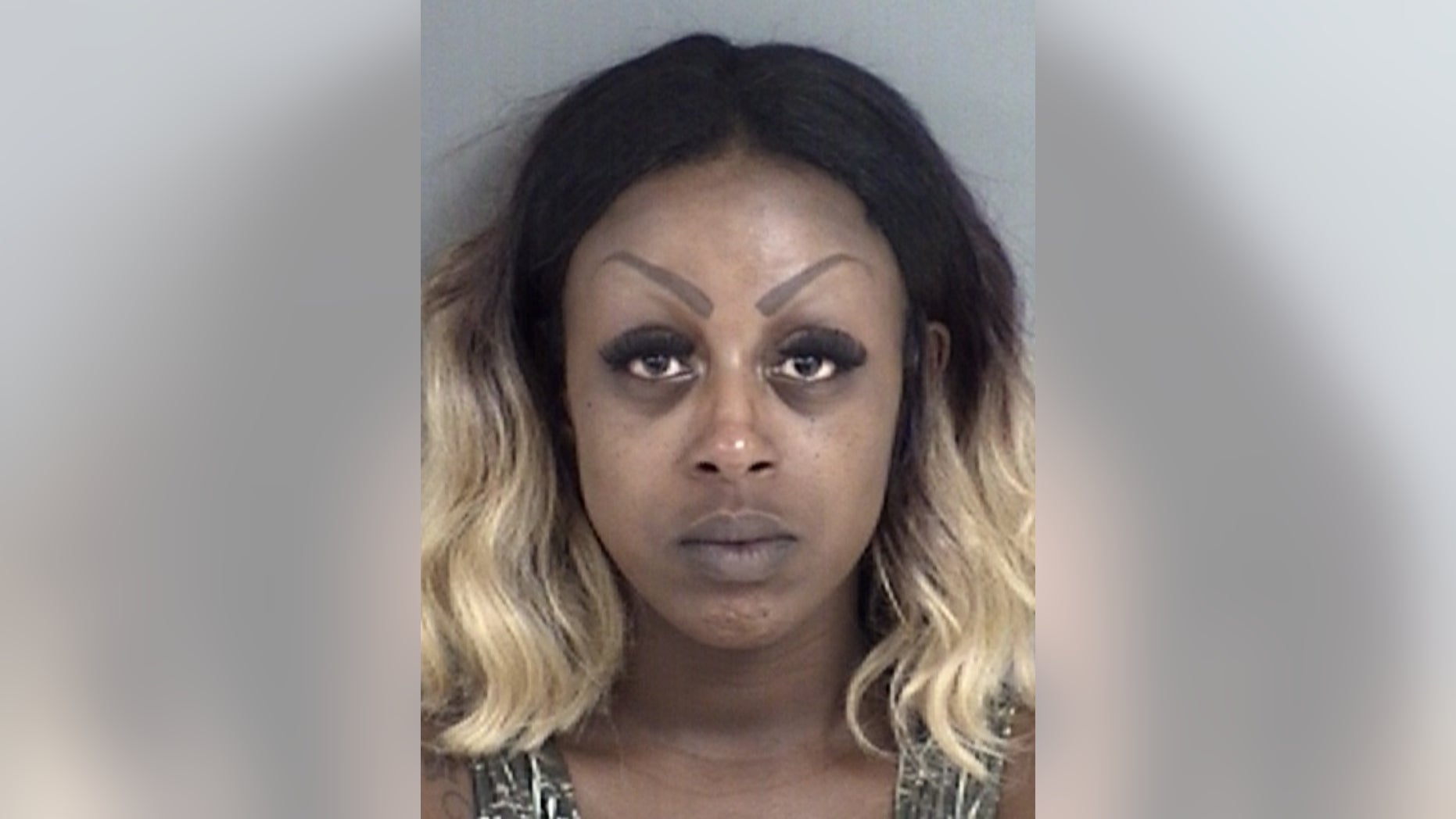 Emily Collier has been charged with aggravated assault against a family member with a weapon.