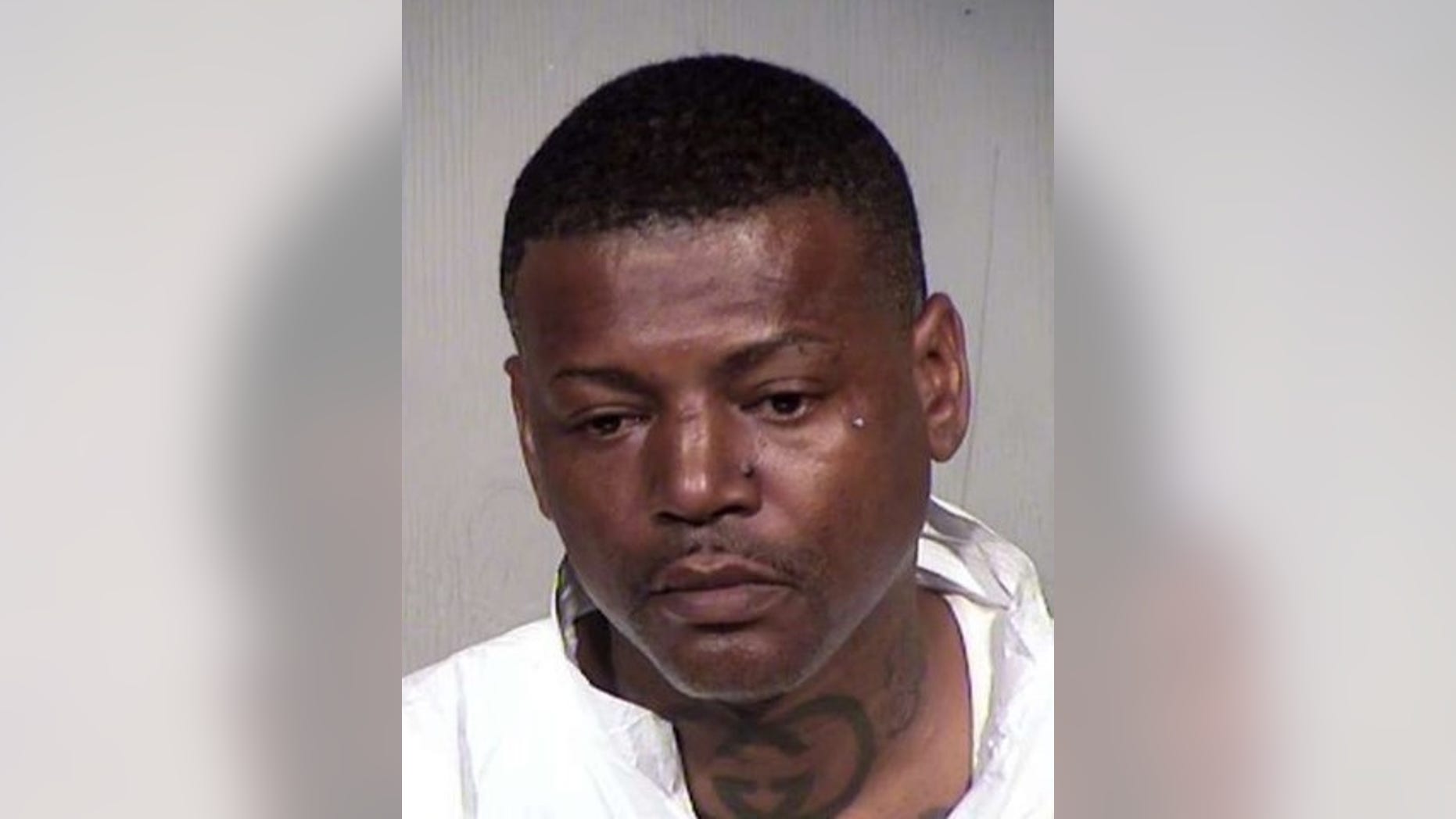 Melvin Harris III, 40, is accused of beating a man to death after finding out the individual tried to get into his daughter's locked bathroom stall.