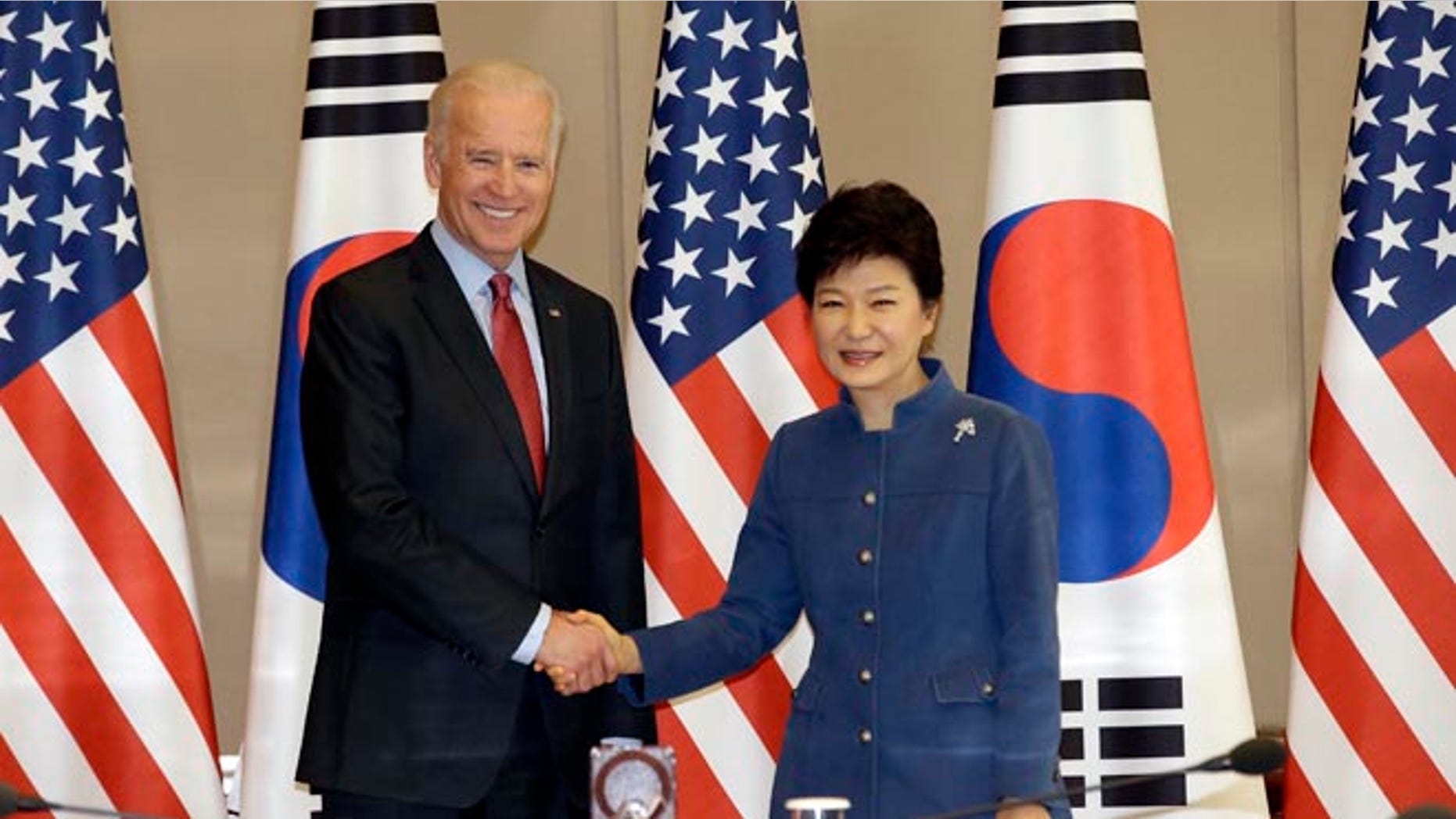 Dec. 6, 2013: South Korean President Park Geun-hye, right, shakes hands with U.S. Vice President Joe Biden before their meeting at the presidential Blue House in Seoul, South Korea.