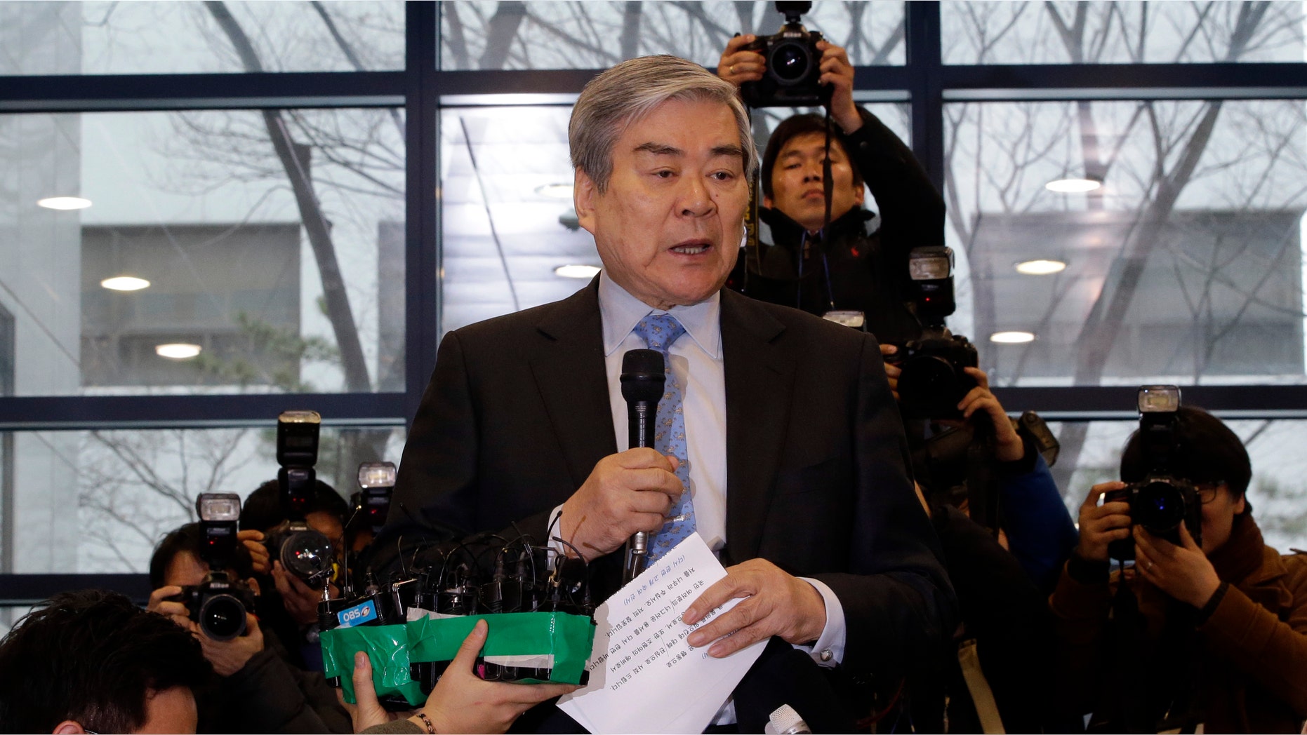 Dec. 12, 2014: Korean Air chairman Cho Yang-ho, speaks to the media about an apology at its head office in Seoul, South Korea