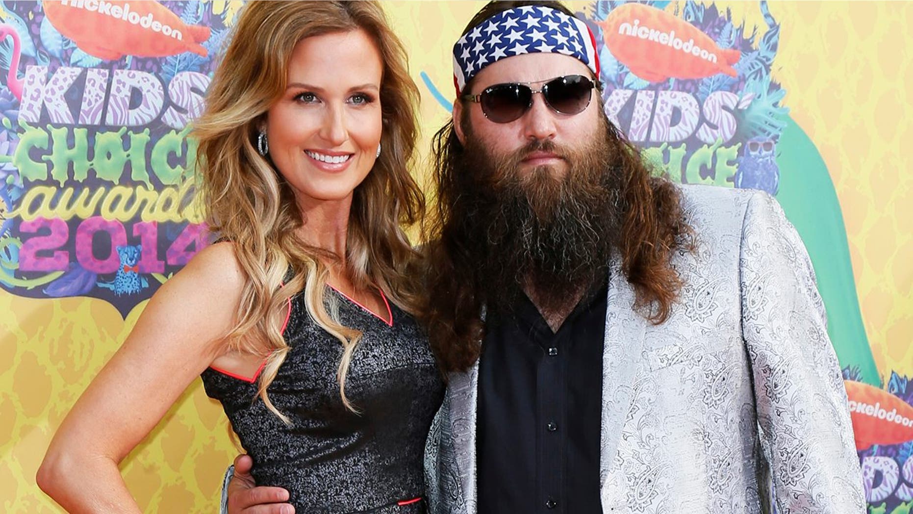 Willie Robertson and Korie Robertson arrive at the 27th Annual Kids' Choice Awards in Los Angeles, California March 29, 2014.