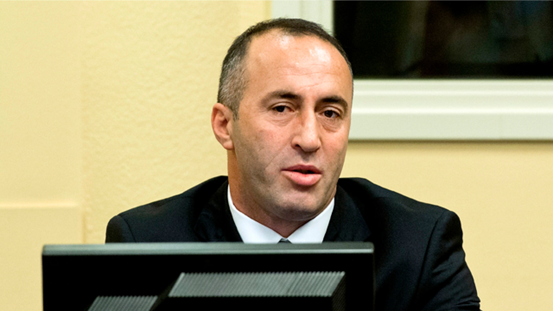 Nov. 29, 2012: Former Kosovo Prime Minister Ramush Haradinaj awaits his verdict at the courtroom of the Yugoslav war crimes tribunal in The Hague, Netherlands.