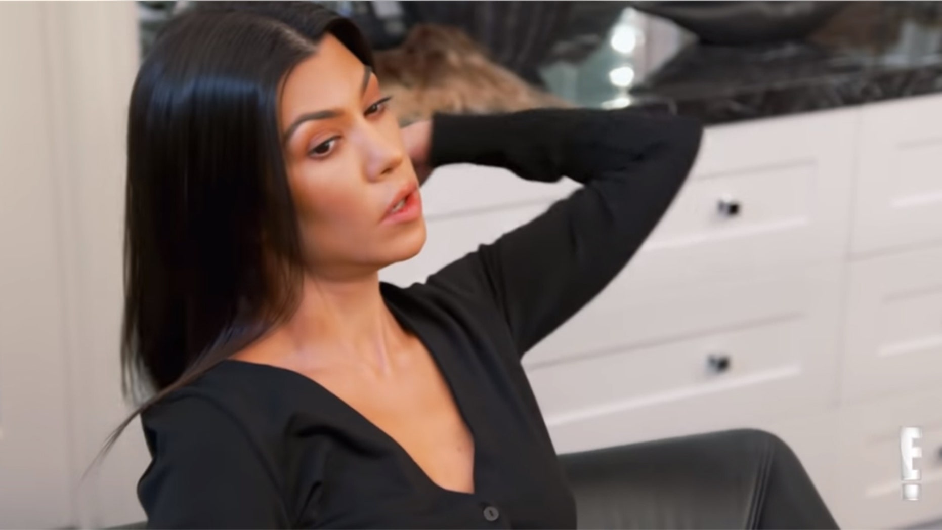 Kourtney Kardashian lashes out at fan who accuses her "never" working.