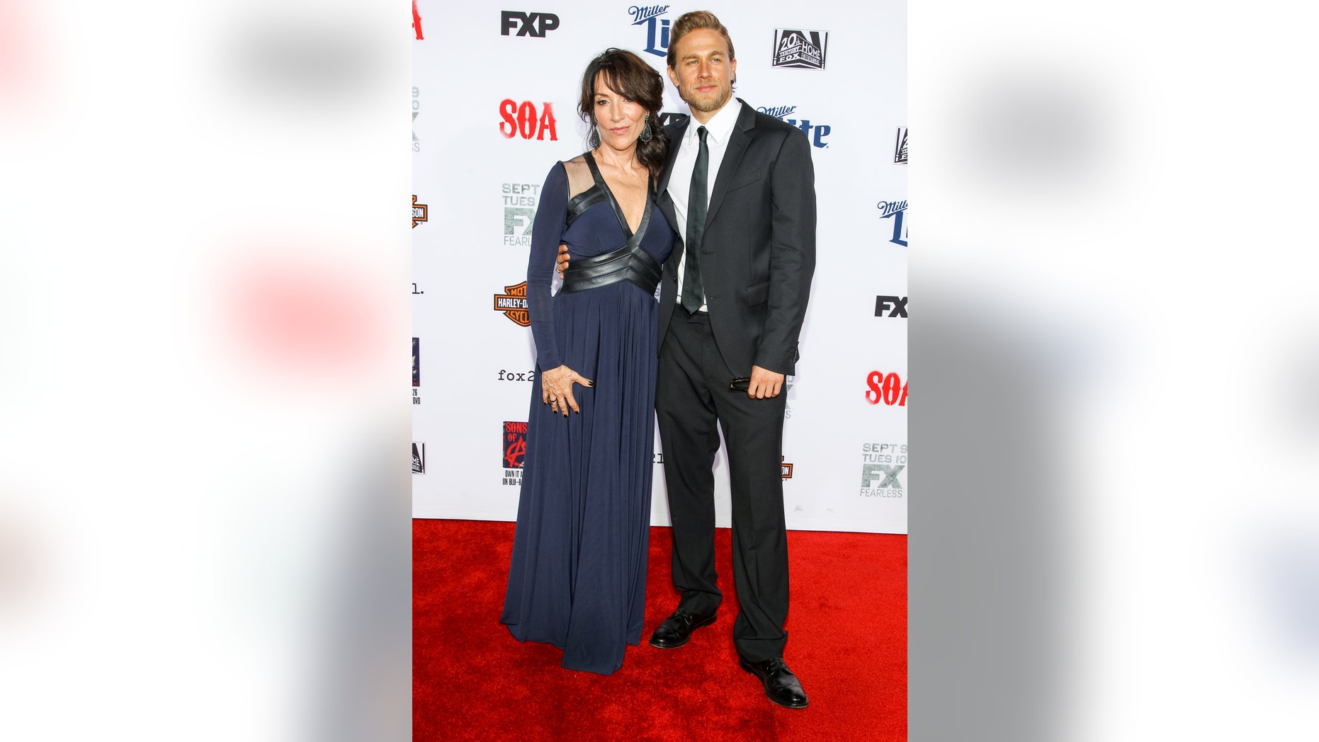 September 6, 2014. Katey Sagal, left, and Charlie Hunnam attend the LA Premiere Screening of "Sons Of Anarchy" at at TCL Chinese Theatre in Los Angeles.