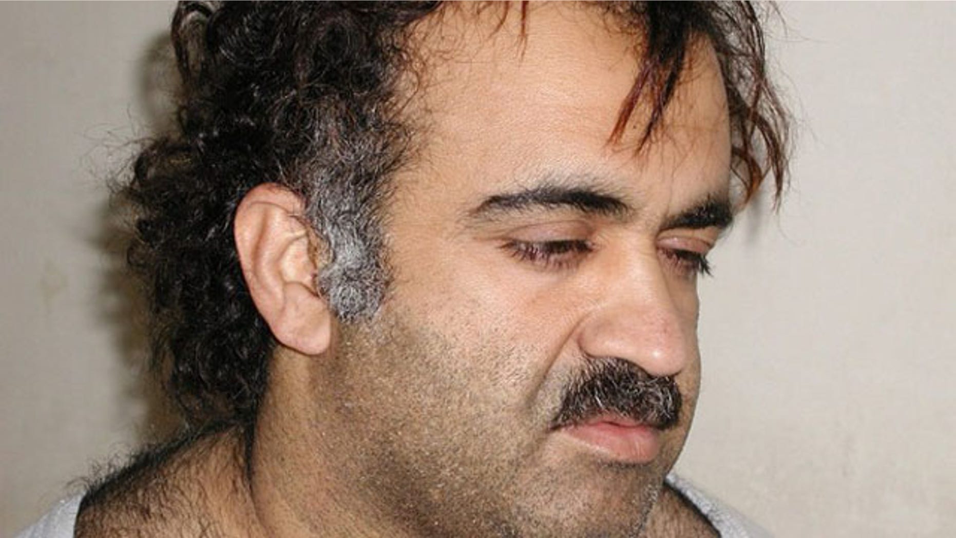 Khalid Sheikh Mohammed is shown in this file photo during his arrest on March 1, 2003. (Reuters Photo)