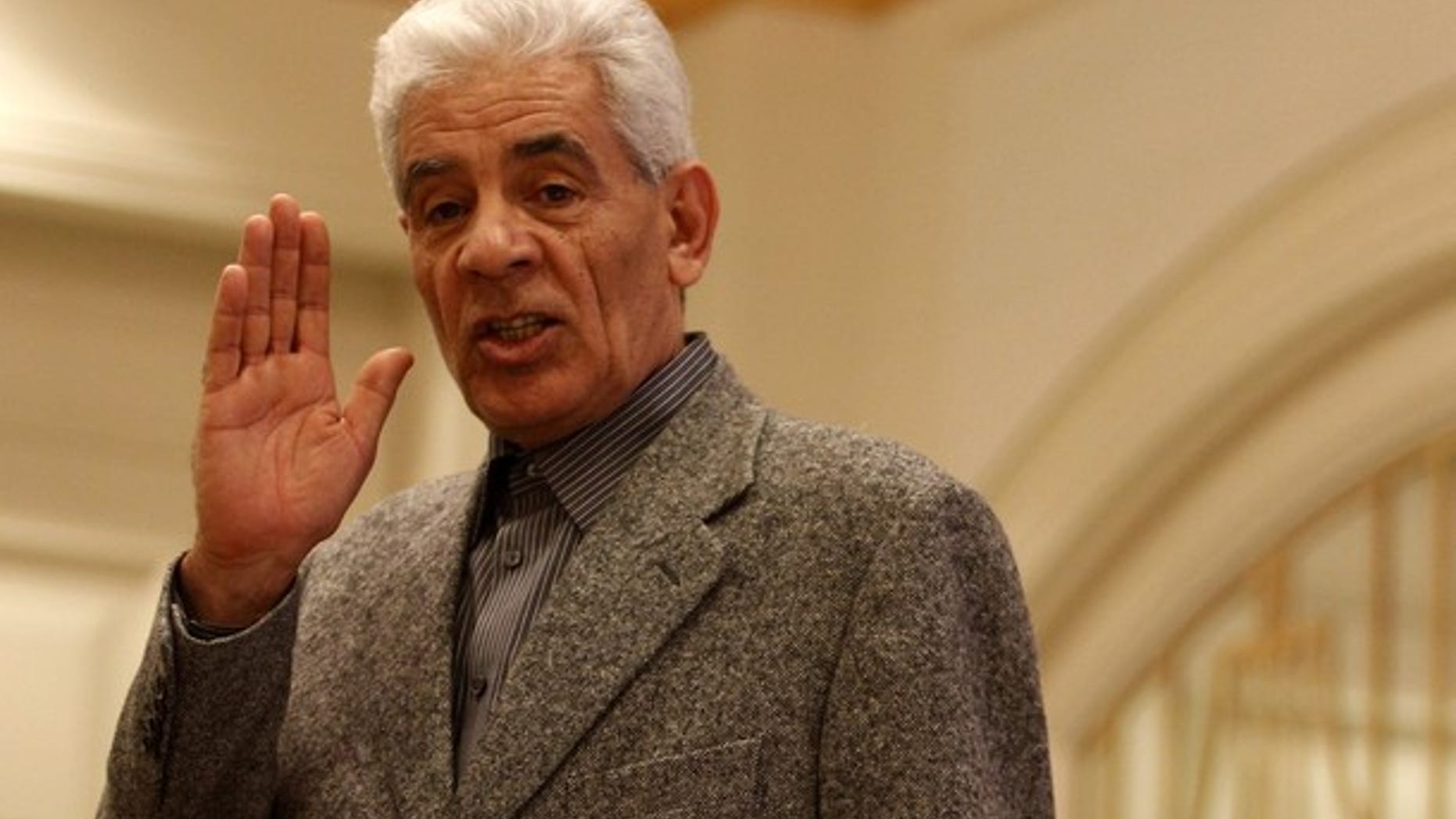 March 7: Libya's Foreign Minister Musa Kusa speaks during a news conference at a hotel housing the foreign press in Tripoli.