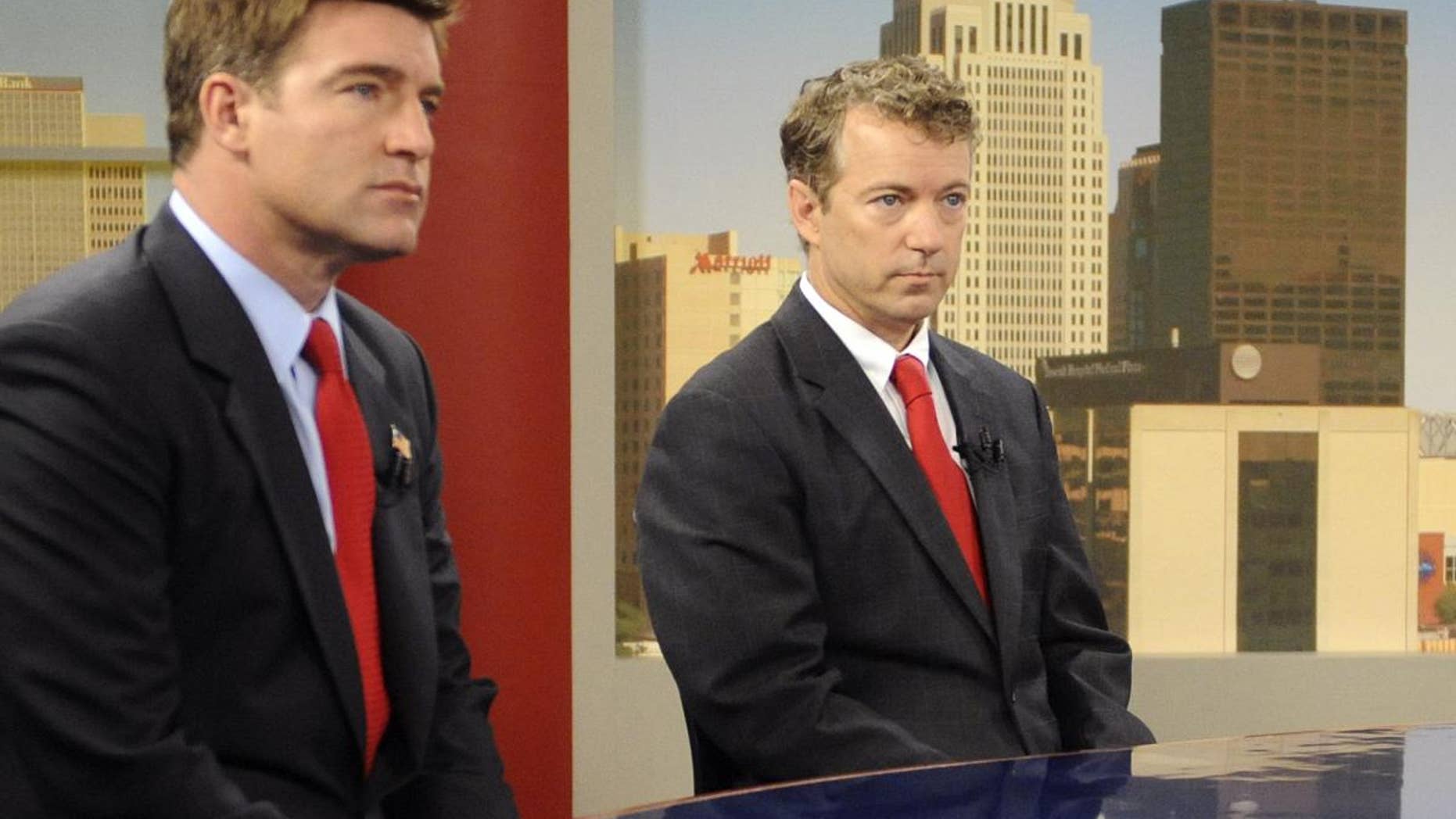Candidates for Kentucky Senate, Democrat Jack Conway, left, and Republican Rand Paul prepare for a debate in Louisville, Ky, Sunday, Oct. 3, 2010. (AP Photo/Patti Longmire)