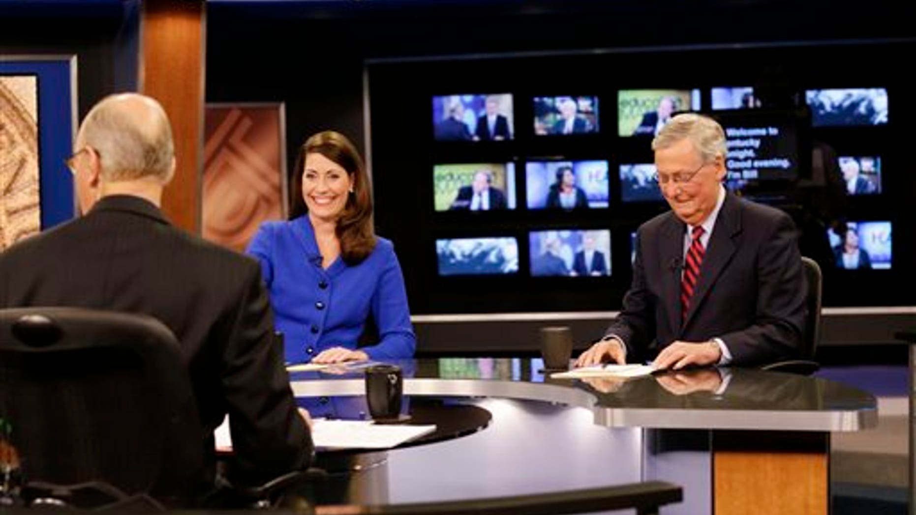 Oct. 13, 2014: U.S. Senate Republican Minority Leader Mitch McConnell Ky., right, and Democratic opponent, Kentucky Secretary of State Alison Lundergan Grimes, rehearse before their appearance on "Kentucky Tonight" in Lexington, Ky.