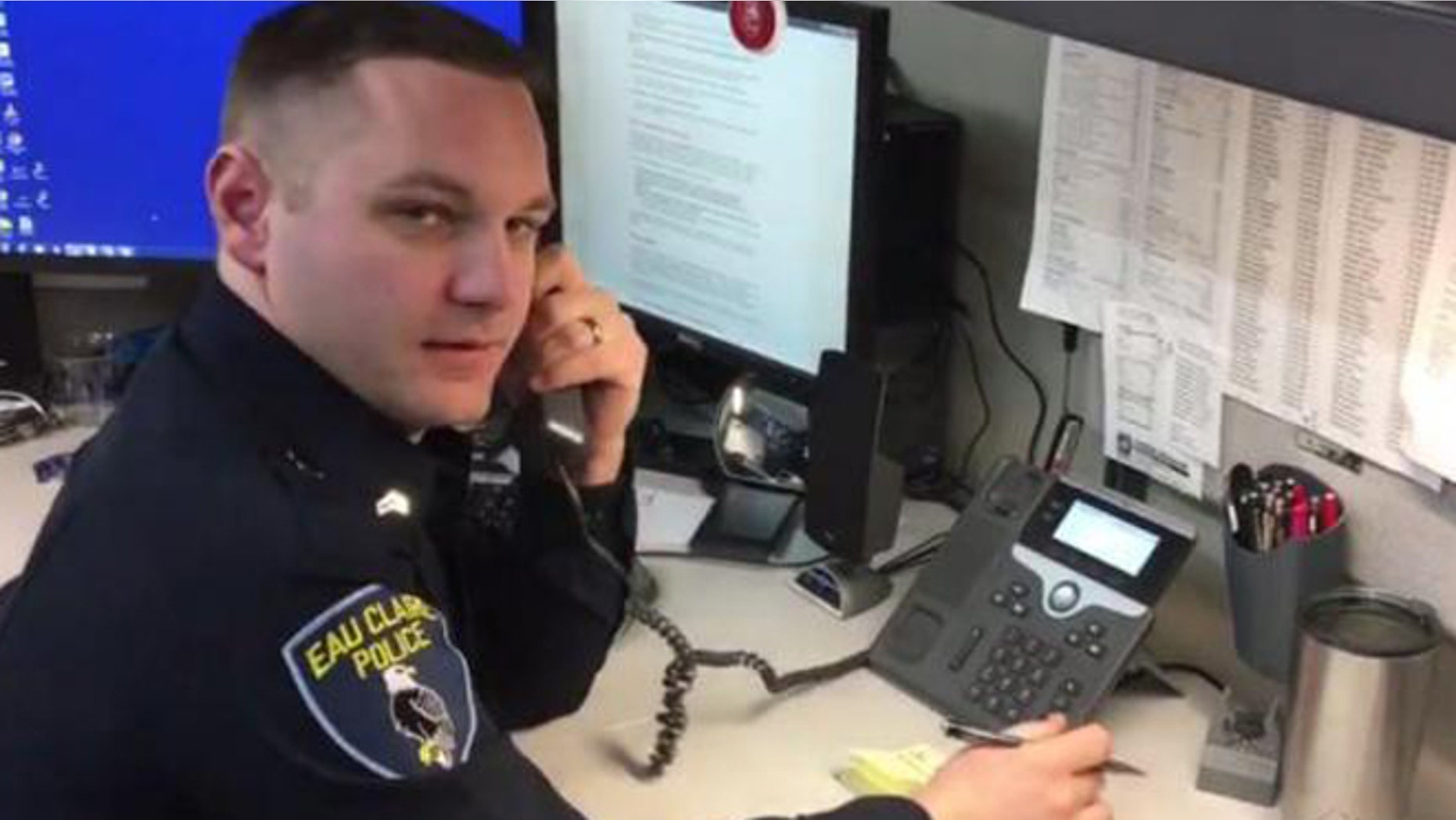 Kyle Roder, a police officer in Eau Claire, Wisconsin, spoke to a scammer posing as an IRS agent in viral video.