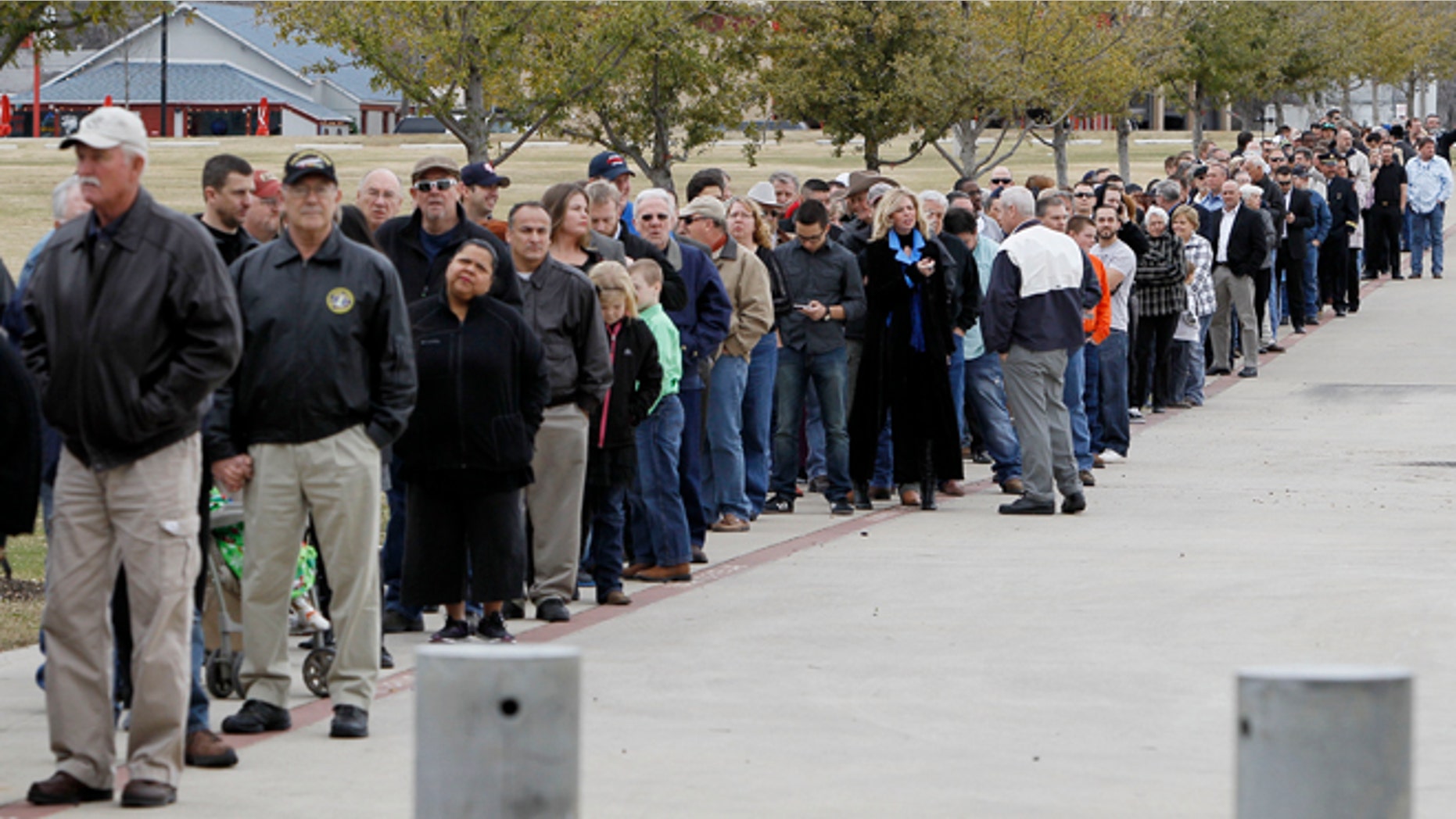 Feb. 11, 2013: People wait in line to attend a memorial service for Christopher Kyle at Cowboys Stadium in Arlington, Texas.