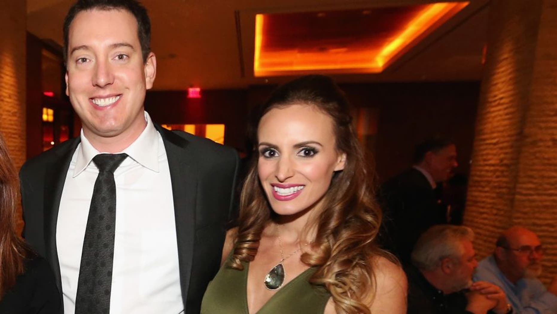 LAS VEGAS, NV - DECEMBER 01: (L-R) Producer Mark Burnett, actress Roma Downey, NASCAR Sprint Cup Series champion Kyle Busch, and Samantha Busch pose during the NASCAR Sprint Cup Series Champion's Dinner at the SW Steakhouse inside Wynn Las Vegas on December 1, 2015 in Las Vegas, Nevada. (Photo by Streeter Lecka/NASCAR via Getty Images)