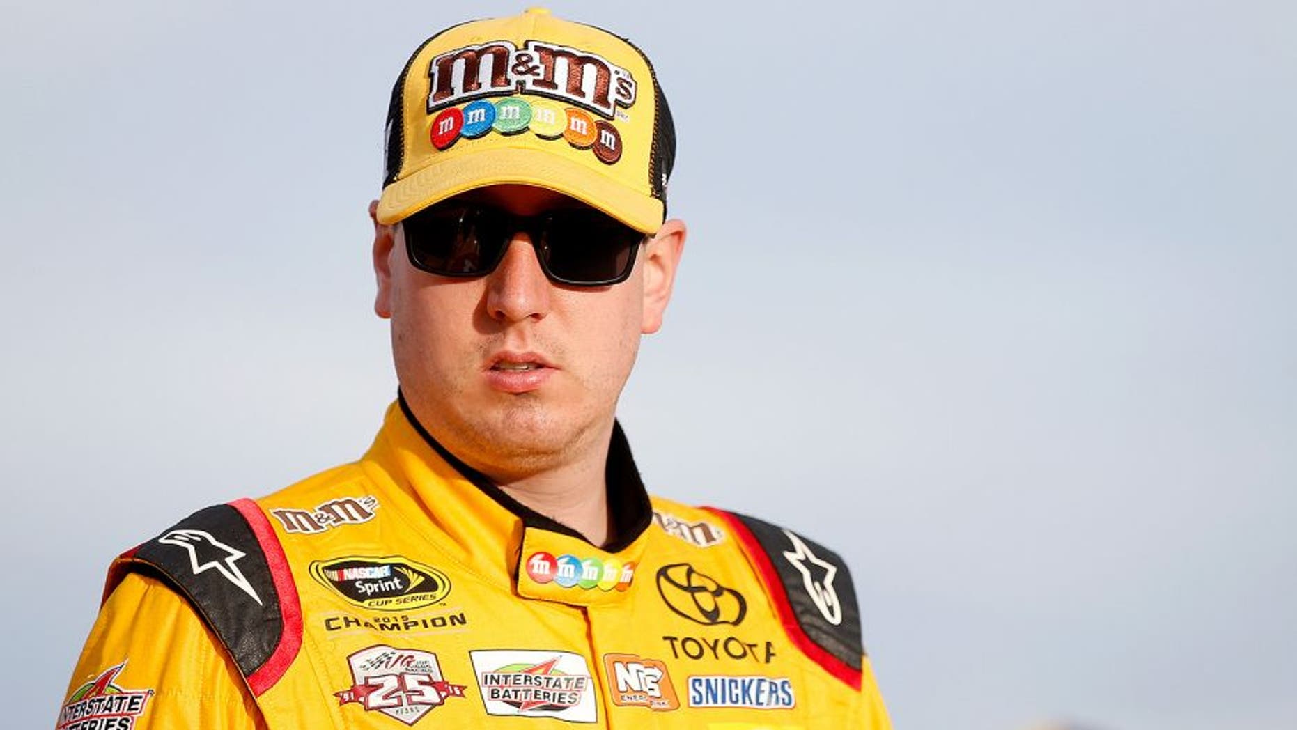 LAS VEGAS, NV - MARCH 04: Kyle Busch, driver of the #18 M&M's 75 Toyota, stands on pit row during qualifying for the NASCAR Sprint Cup Series Kobalt 400 at Las Vegas Motor Speedway on March 4, 2016 in Las Vegas, Nevada. (Photo by Todd Warshaw/Getty Images)