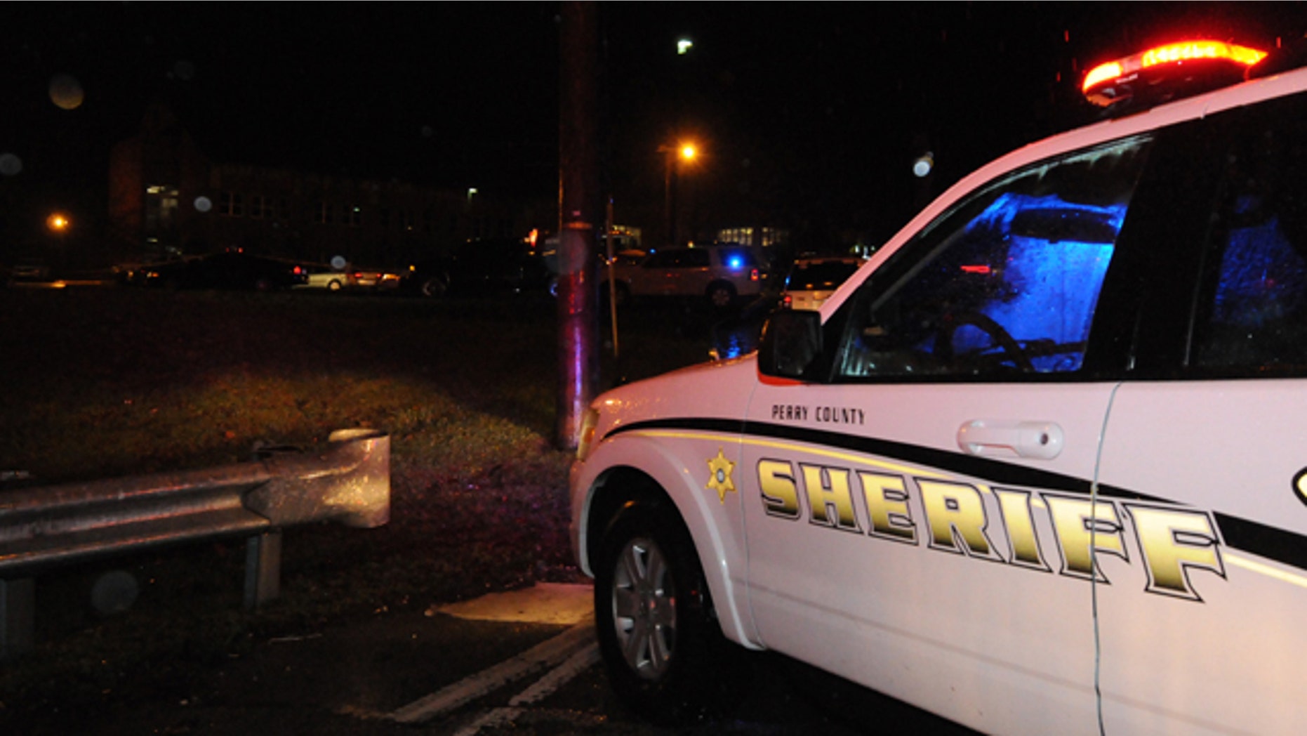 Jan. 15, 2012: Members of the Perry County Sheriff Office respond to the scene at Hazard Community College on Tuesday night.