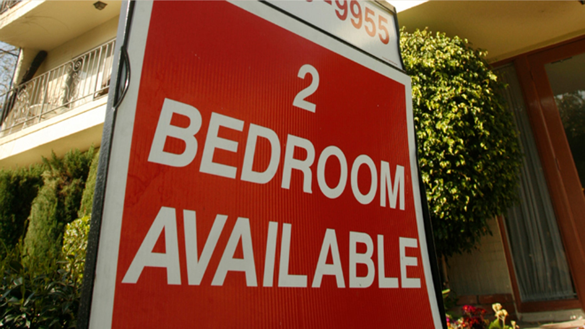 This file photo shows a sign at an apartment building in Los Angeles.