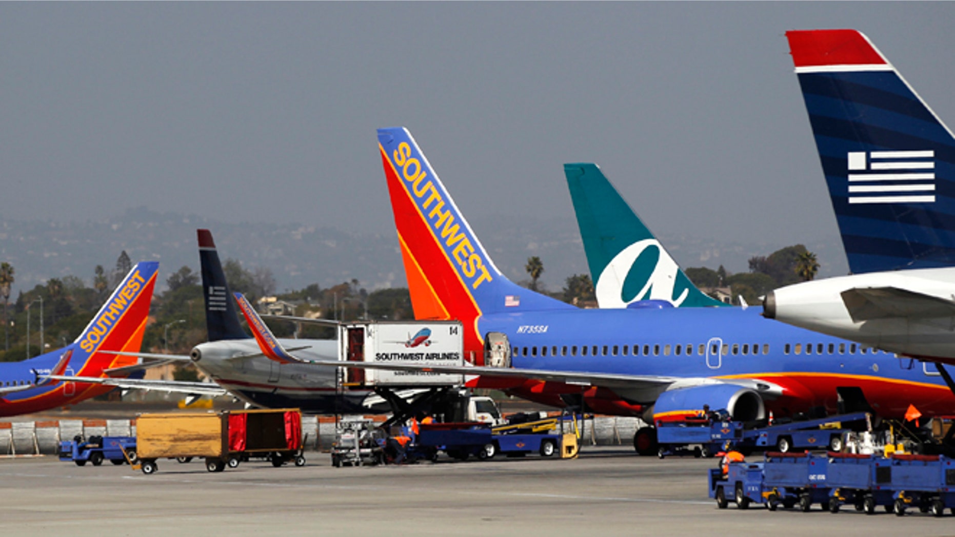 FILE: Airplanes are seen parked at Los Angeles International Airport last March.
