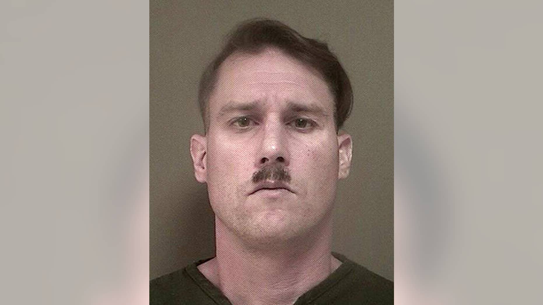 This photo provided Monday May 16, 2016 by New Jersey's Ocean County Jail shows Bruce Post III, who was arrested by Lacey, N.J., police on Sunday, May 15, 2016 after authorities ay they found a large cache of weapons and ammunition in the New Jersey Pinelands.