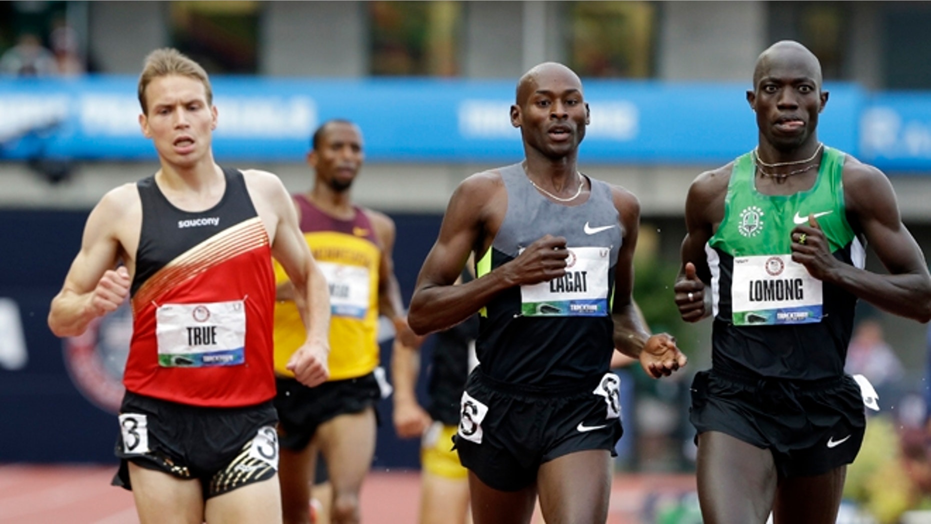 June 25, 2012L Lopez Lomong and Bernard Lagat finish the men's 5000m preliminary at the U.S. Olympic Track and Field Trials in Eugene, Ore.