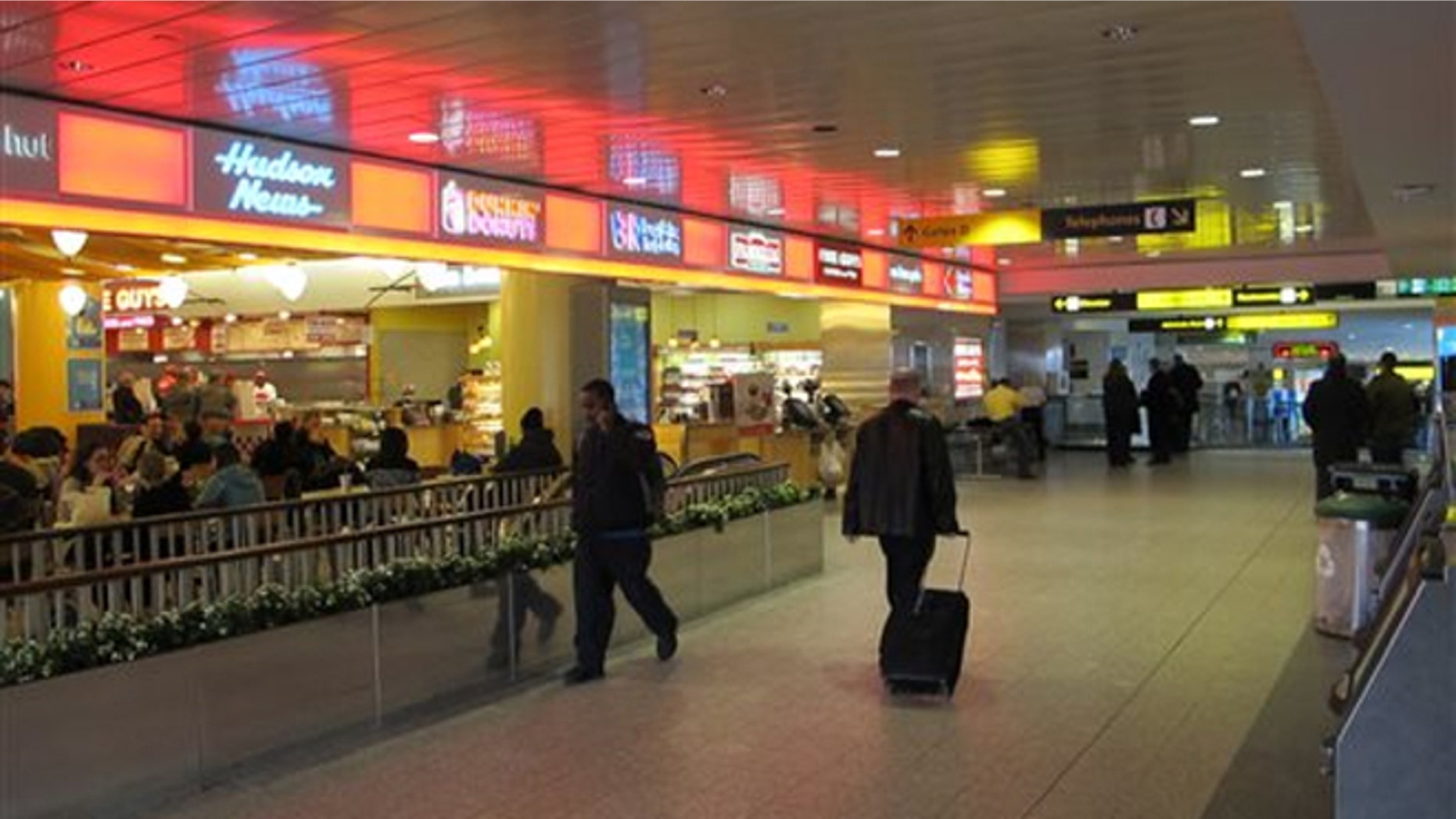Jan. 10, 2014: Passengers maneuver through one of the cramped hallways at New York's LaGuardia Airport.