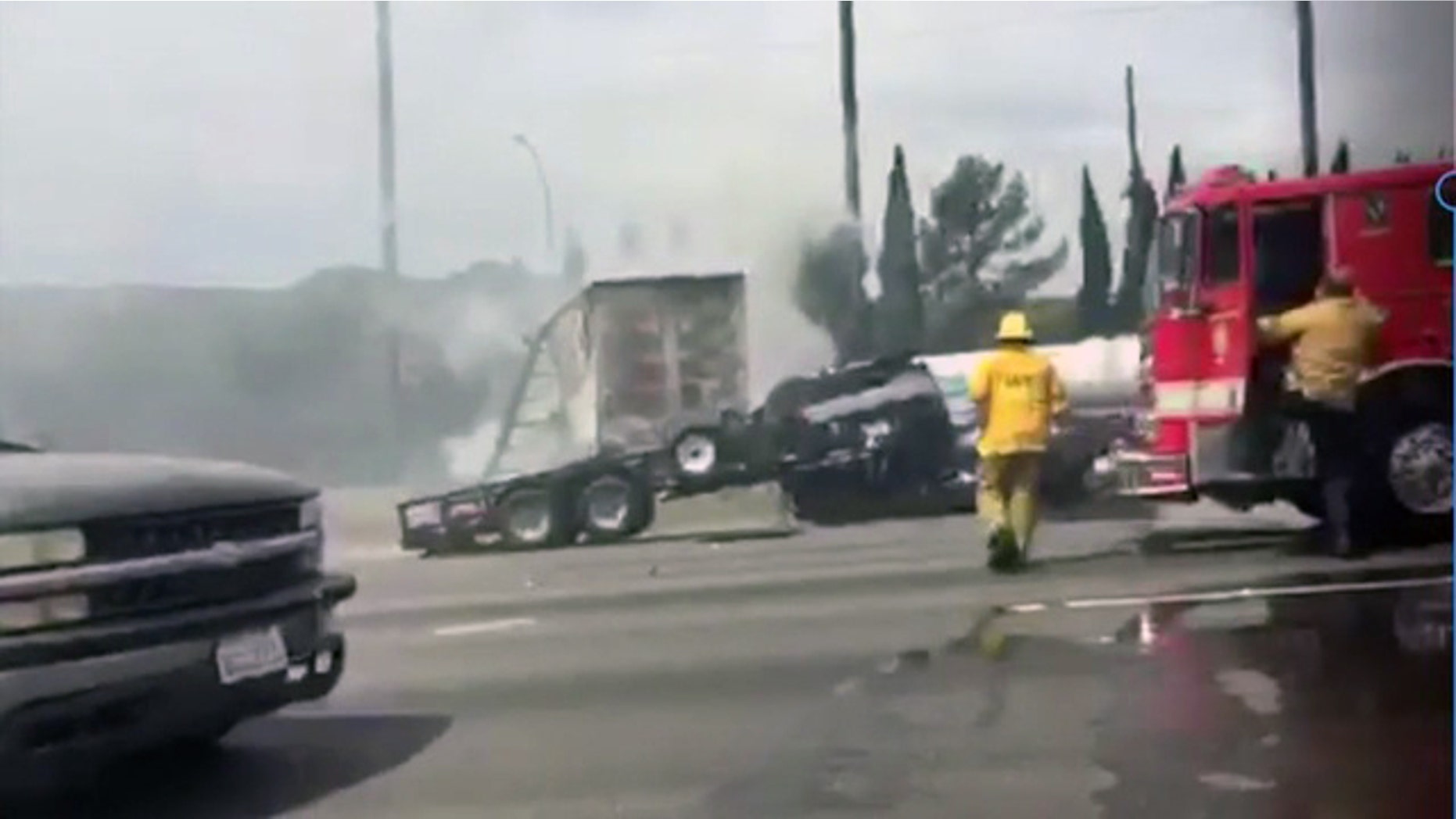 Firefighters respond to a deadly crash on Interstate 5 in Los Angeles Tuesday, April 25, 2017.