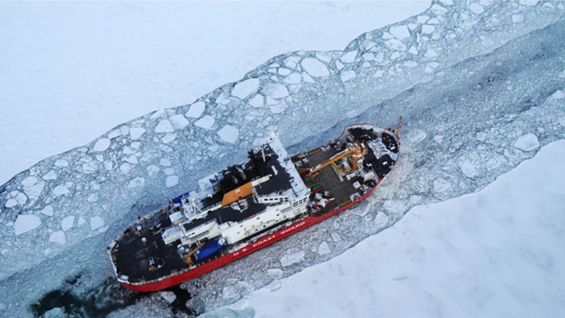 Dec. 26, 2013: In this photo provided by the U.S. Coast Guard the icebreaker Mackinaw maintains a shipping lane on the St. Marys River linking Lakes Superior and Huron.