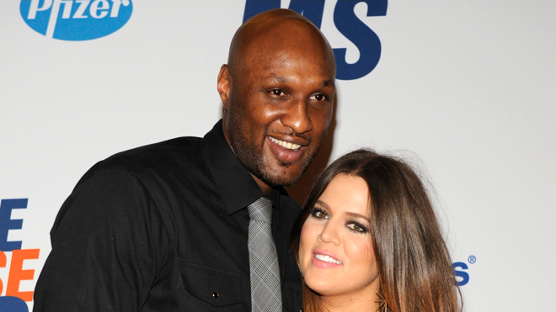 May 18, 2012. Lamar Odom (L), basketball player with the Dallas Mavericks of the NBA, and his wife Khloe Kardashian-Odom arrive for the 19th annual Race to Erase MS Gala in Los Angeles.