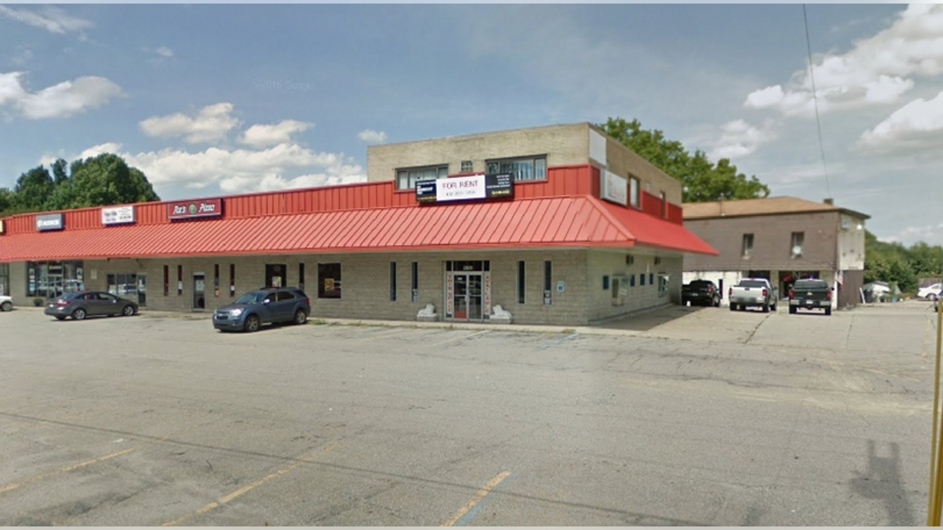 Allison Plusquellic was drinking at the Lamp Post (pictured) in Lower Burrell, Penn., the night she climbed into the wrong house and bed, police said. (Google Maps)
