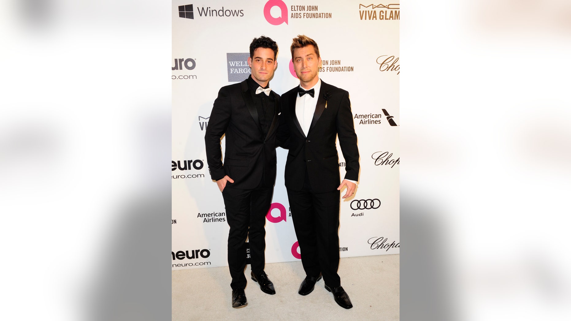 March 2, 2014. Pop singer Lance Bass (R) and Michael Turchin arrive at the 2014 Elton John AIDS Foundation Oscar Party in West Hollywood, California.