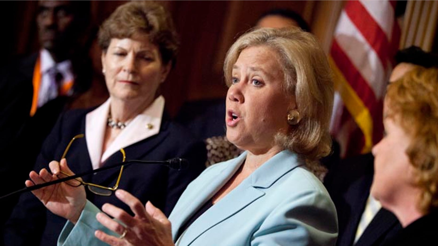 Oct. 3, 2013: Sen. Mary Landrieu, D-La., center, joined by Sen. Jeanne Shaheen, D-N.H., left, Sen. Heidi Heitkamp, D-N.D., right, she speaks during a news conference on Capitol Hill in Washington. (AP)