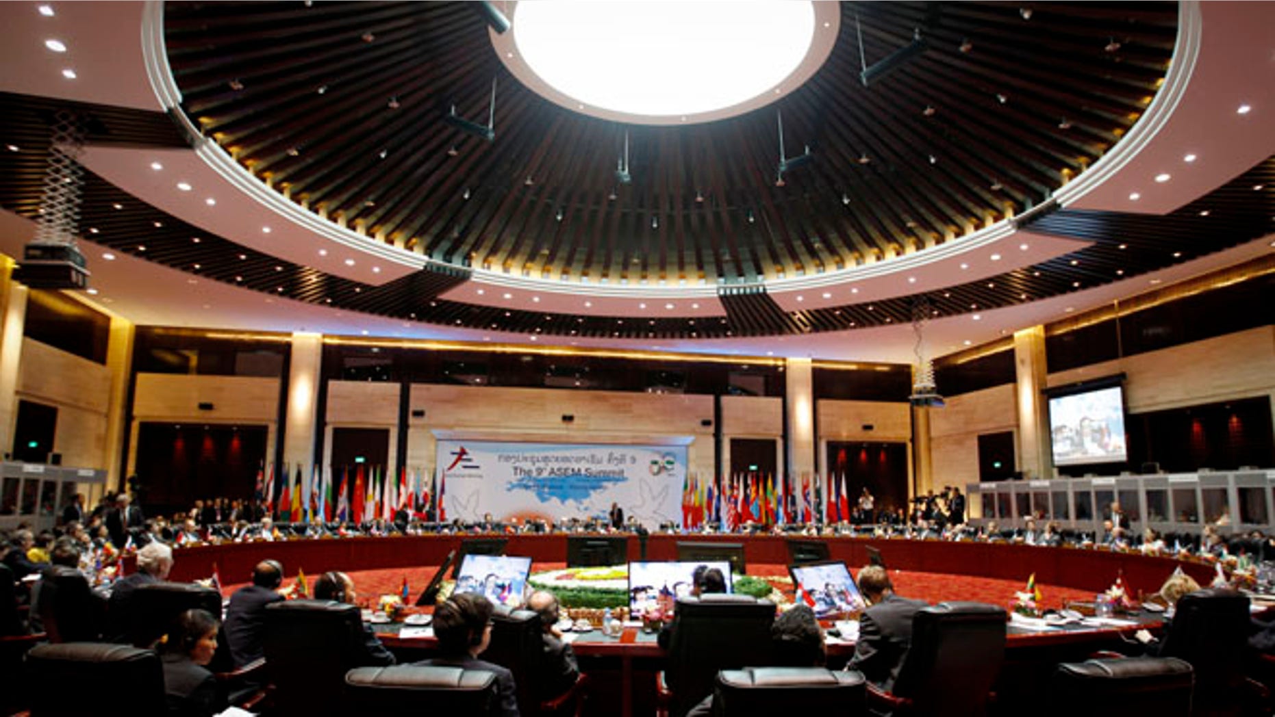 Nov. 6, 2012: European and Asian leaders take part in the closing ceremony for the ASEM Summit in Vientiane, Laos.