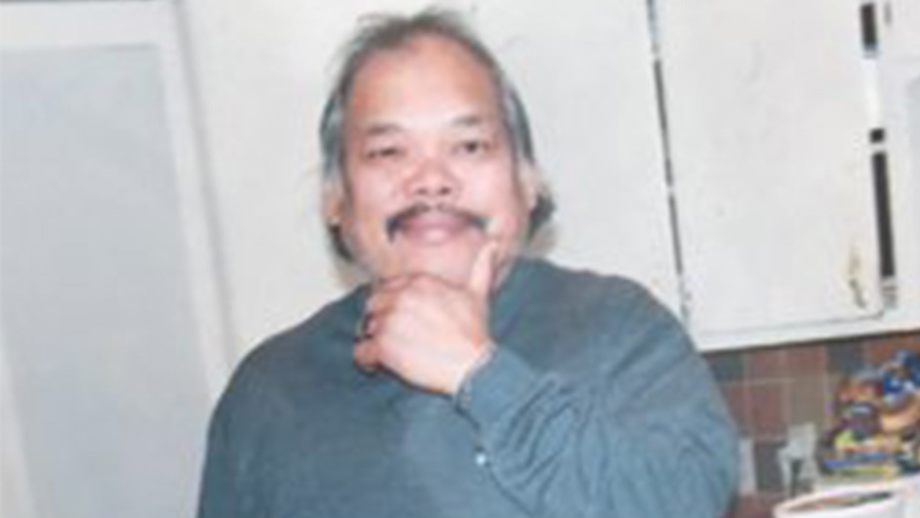 Larry San Nicholas was shot by police officers Sunday after they say he lunged at them with two swords.