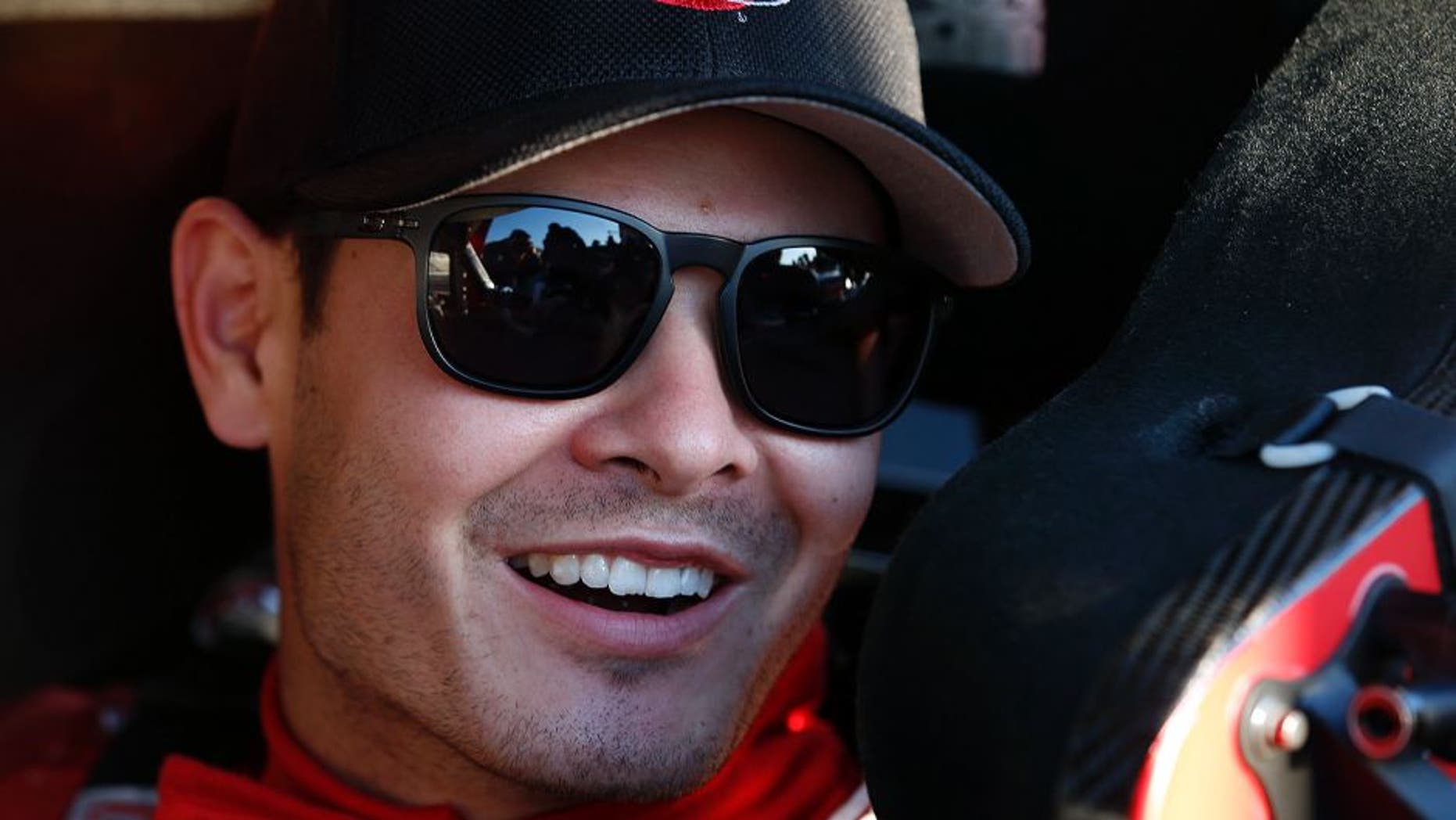 HAMPTON, GA - FEBRUARY 26: Kyle Larson, driver of the #42 Target Chevrolet, sits in his car prior to qualifying for the NASCAR Sprint Cup Series Folds of Honor QuikTrip 500 at Atlanta Motor Speedway on February 26, 2016 in Hampton, Georgia. (Photo by Todd Warshaw/NASCAR via Getty Images)