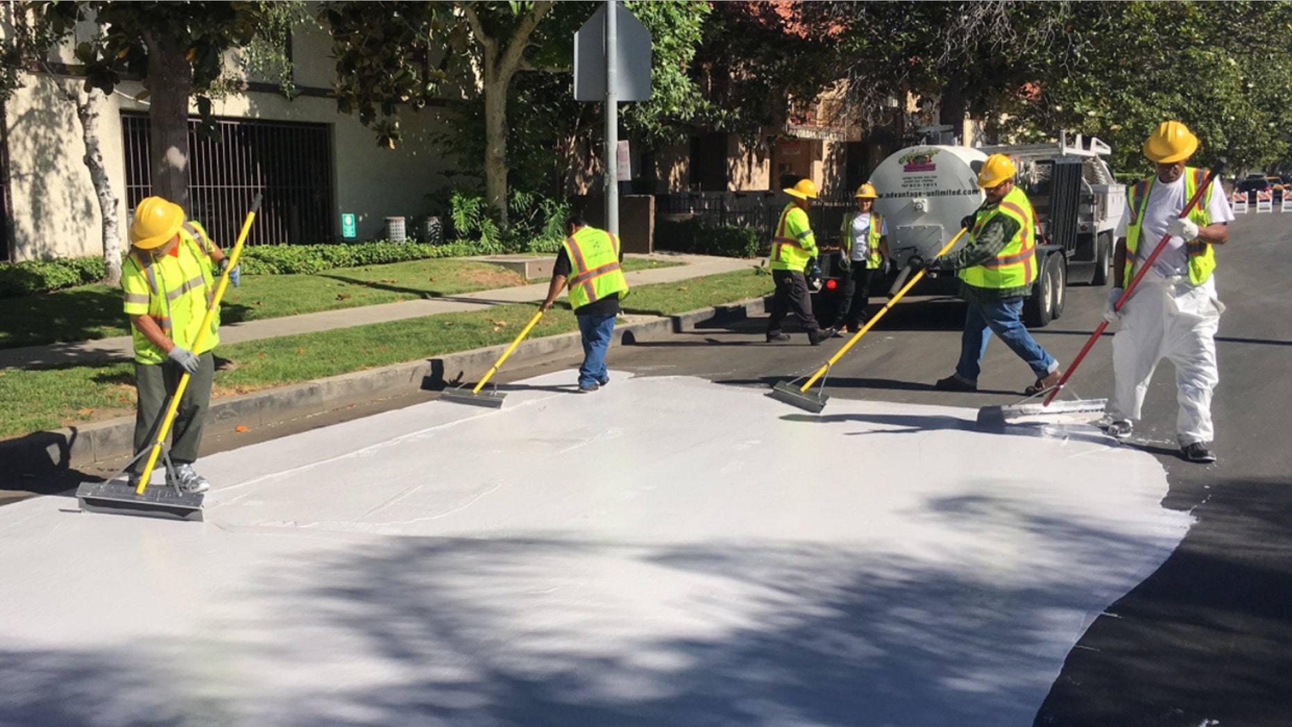 Officials in Los Angeles are painting streets white to reduce the effect of urban "heat islands."