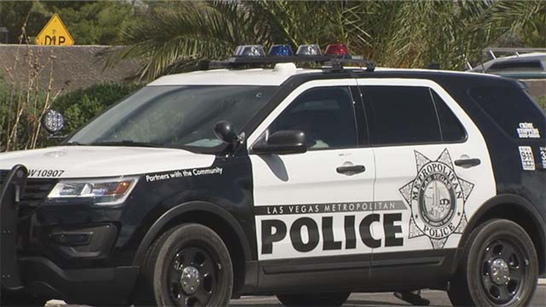 A Las Vegas Metro vehicle at the scene of a home invasion in the northwest part of town on Sept. 28, 2016