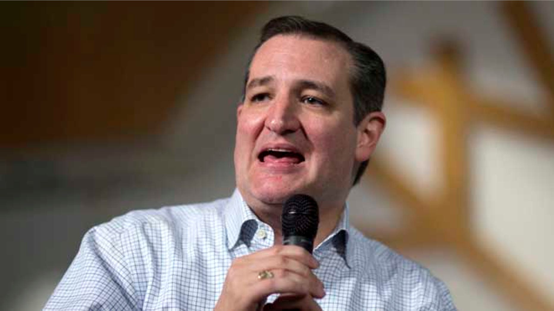 In this photo taken Dec. 23, 2015, Republican presidential hopeful Ted Cruz speaks in Oklahoma City. Cruz's campaign says on Dec. 30 it has raised nearly $20 million over the last three months. (AP Photo/J Pat Carter)