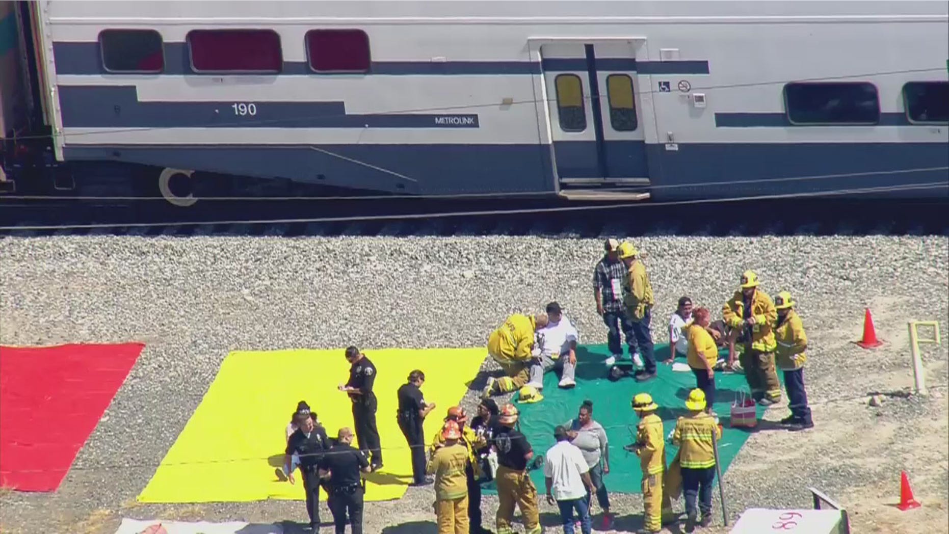 Sept. 6, 2016: Injured passengers are treated by paramedics after a Metrolink commuter train collided with a box truck outside Los Angeles