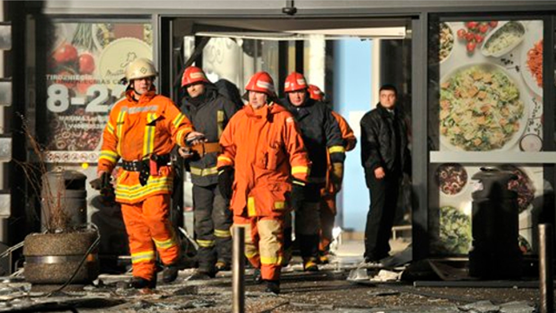 Nov. 21, 2013: Rescuers work at the Maxima grocery store after its roof collapsed in Riga, Latvia.