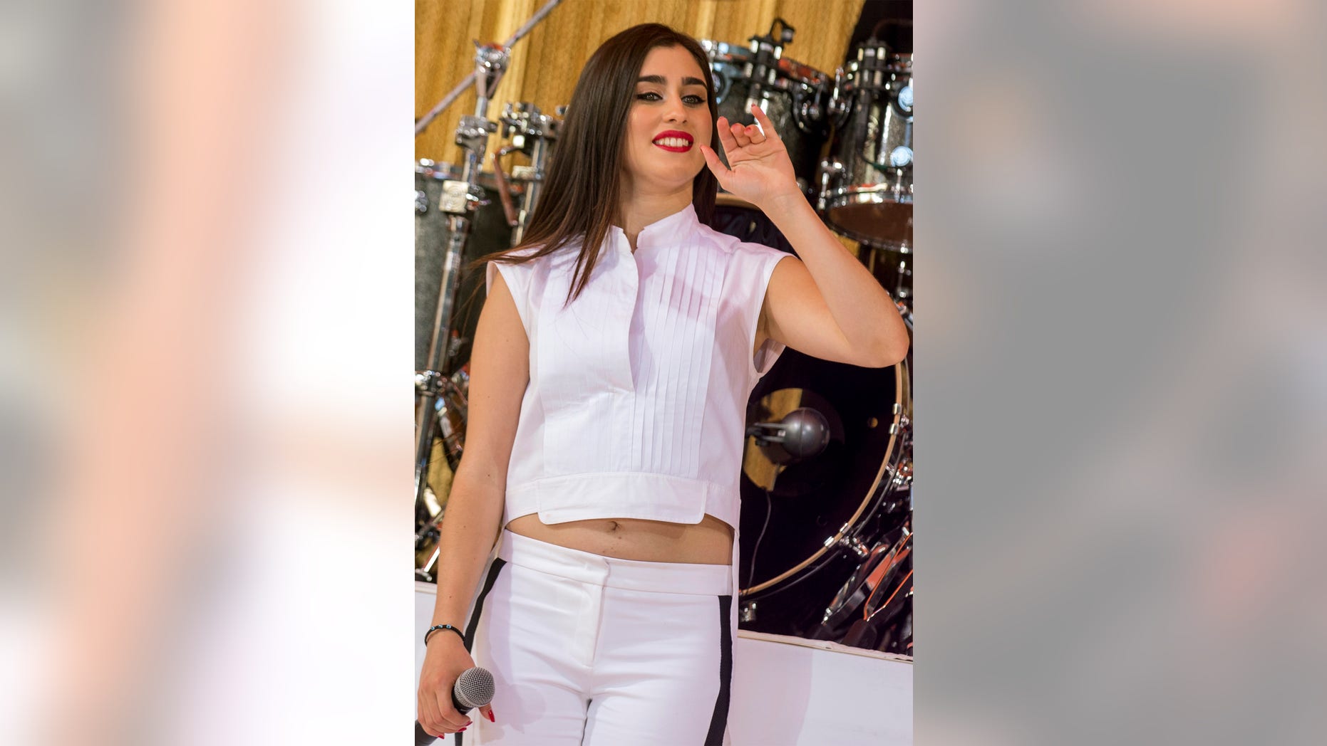 Lauren Jauregui of pop group 'Fifth Harmony' appears on NBC's 'Today' show in New York July 11, 2014. REUTERS/Brendan McDermid (UNITED STATES - Tags: ENTERTAINMENT PROFILE) - RTR3Y7IA
