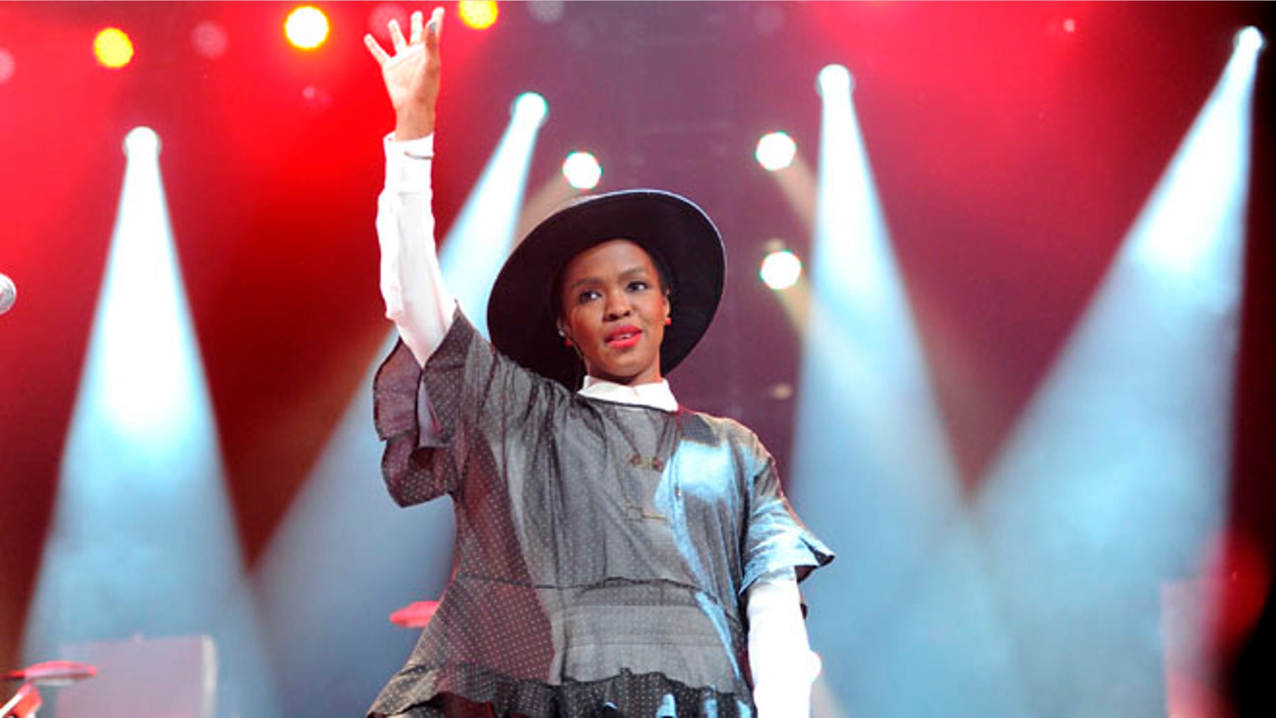 Feb. 5, 2014 file photo, singer Lauryn Hill performs at Amnesty International's "Bringing Human Rights Home" Concert at the Barclays Center in New York.