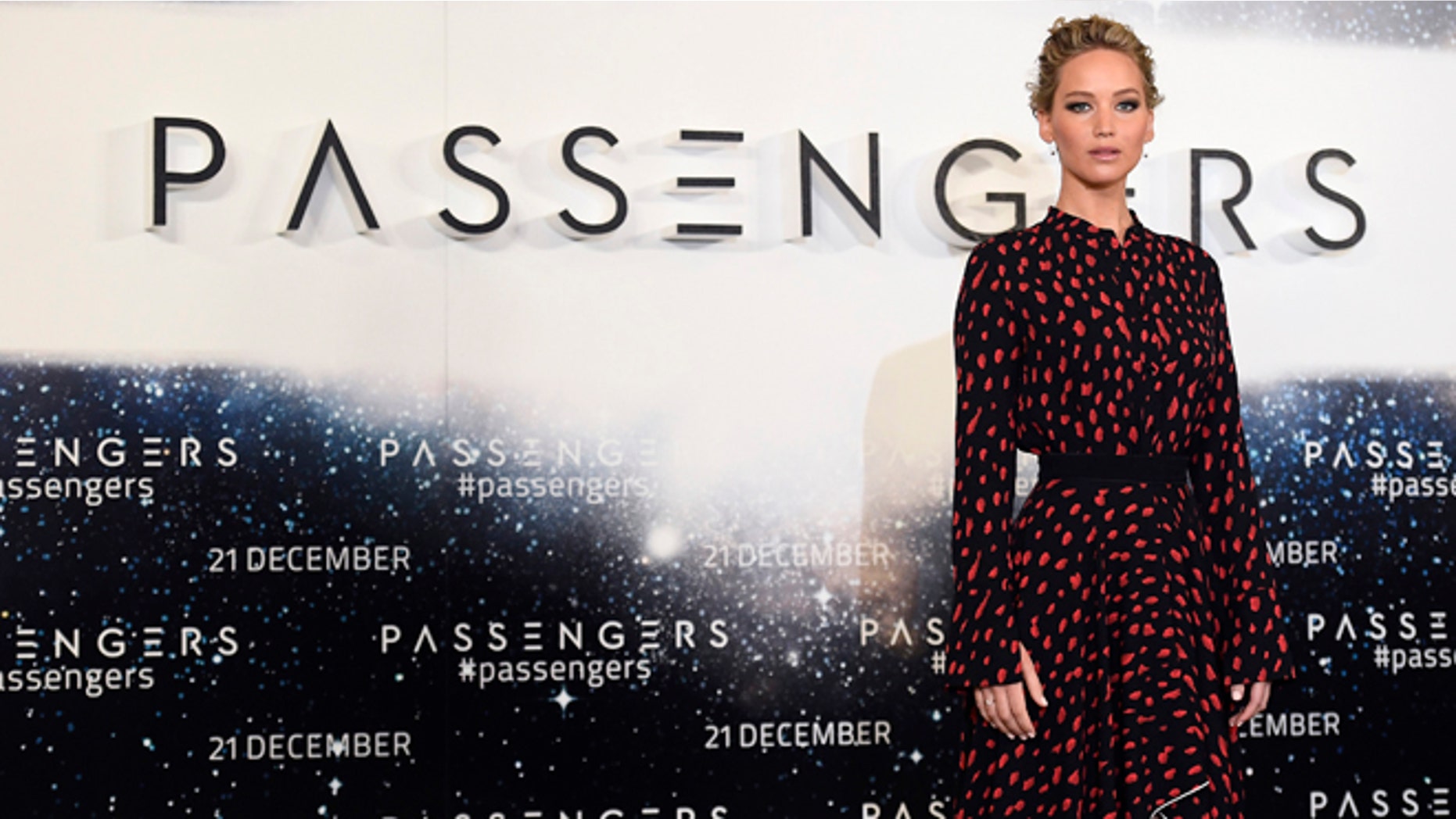 Jennifer Lawrence says she almost killed her sound man when she scratched her butt on set.