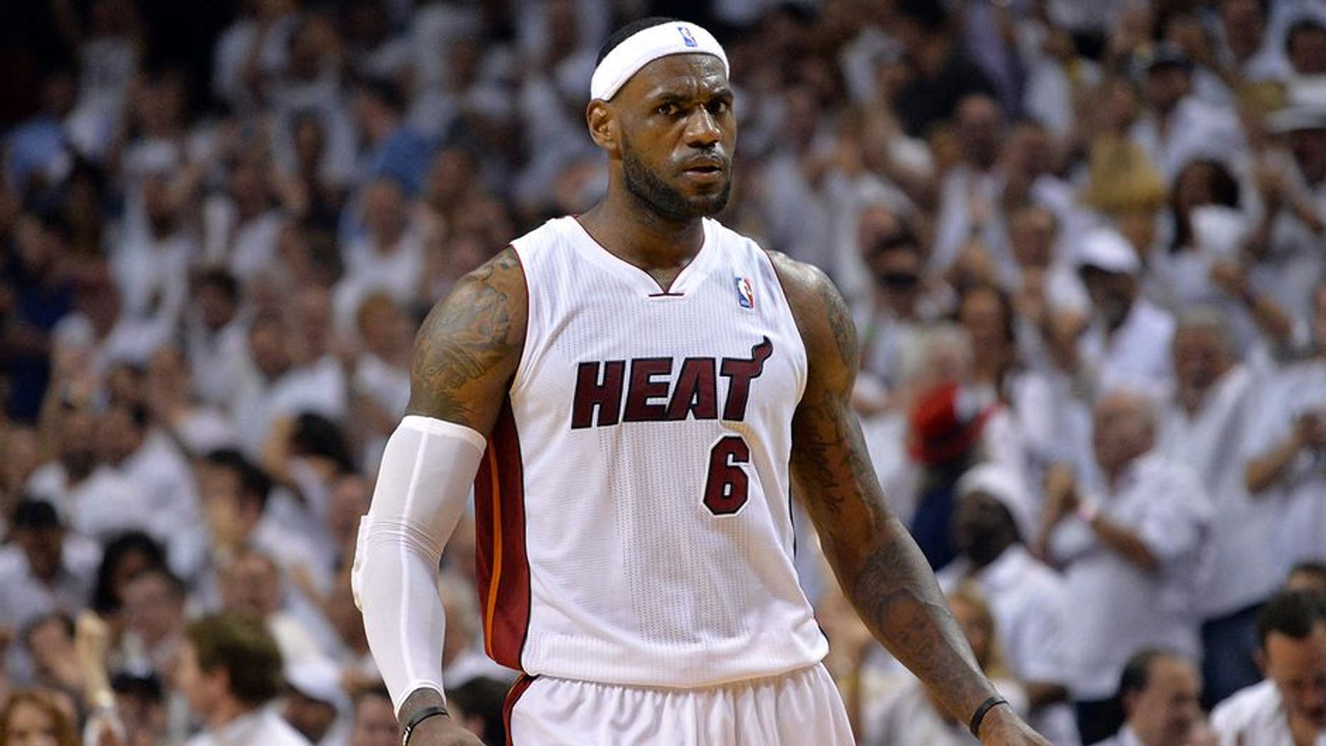 May 26, 2014; Miami, FL, USA; Miami Heat forward LeBron James (6) reacts against the Indiana Pacers in game four of the Eastern Conference Finals of the 2014 NBA Playoffs at American Airlines Arena. The Heat won 102-90. Mandatory Credit: Steve Mitchell-USA TODAY Sports