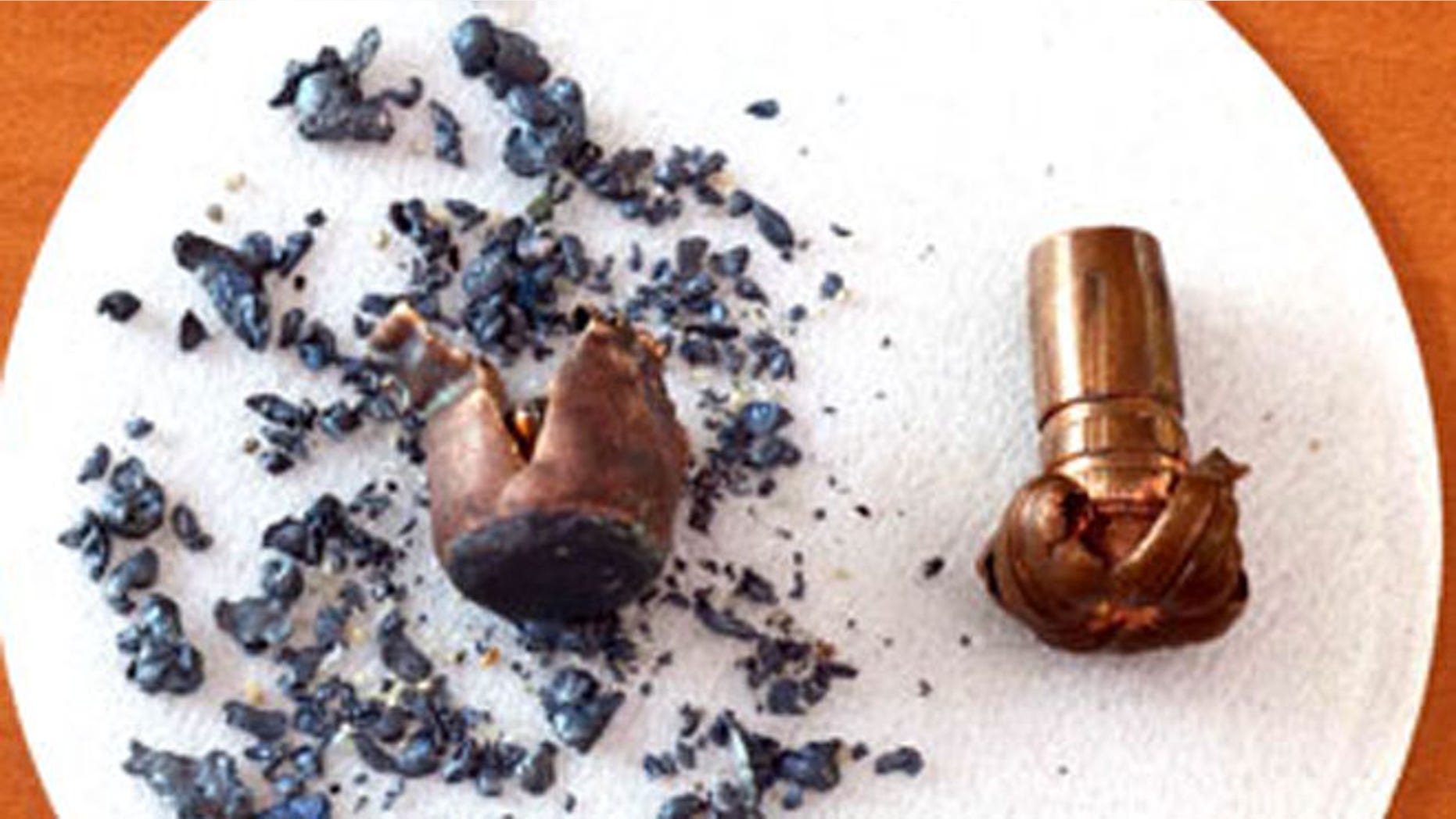 File: Two .270 caliber bullets discharged and retrieved. The non-lead bullet is on the right. The lead bullet is on the left.