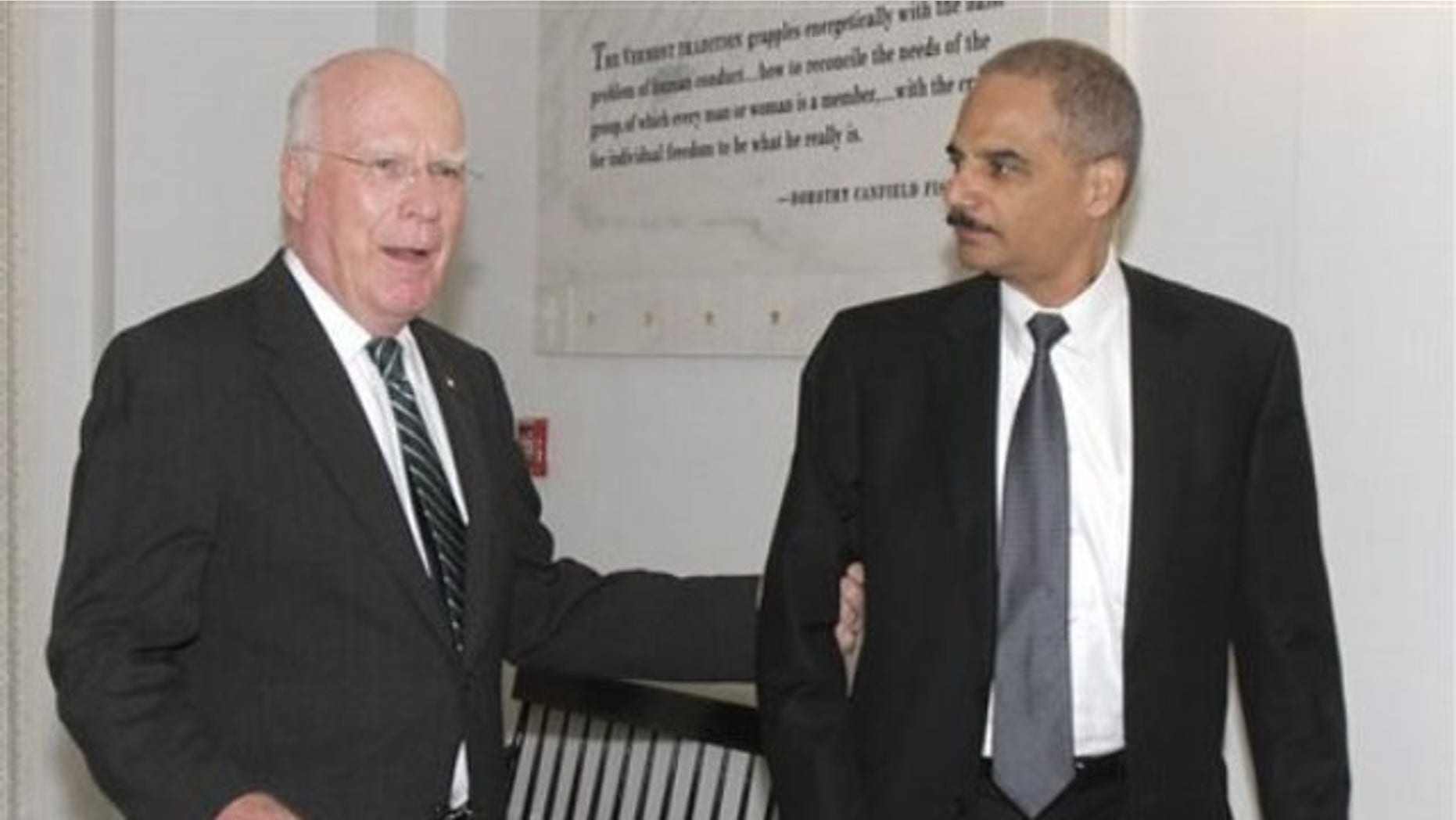 Attorney General Eric Holder, right, is shown with Sen. Patrick Leahy in Montpelier, Vt., Sept. 10. (AP Photo)