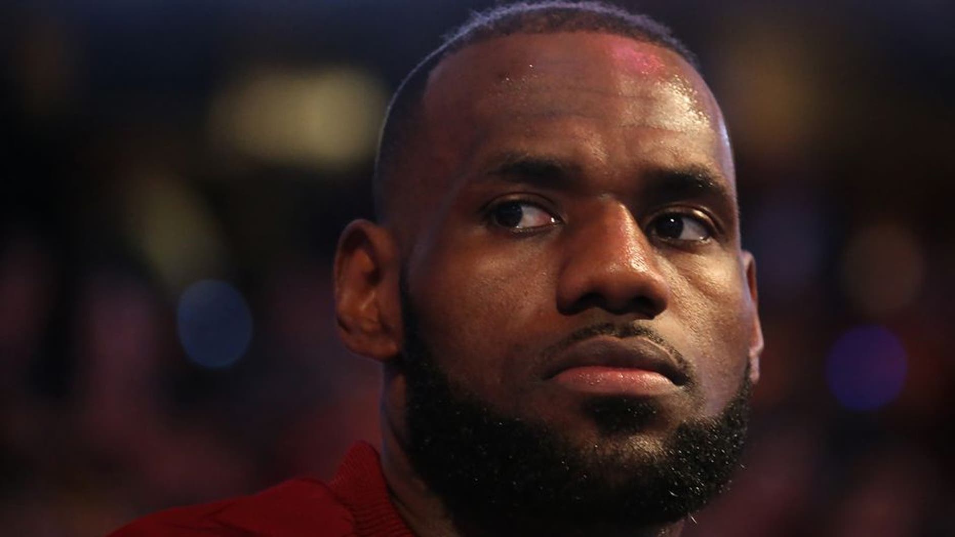 CLEVELAND, OH - JUNE 7: LeBron James #23 of the Cleveland Cavaliers during the national anthem before the game against the Golden State Warriors in Game Three of the 2017 NBA Finals on June 7, 2017 at Quicken Loans Arena in Cleveland, Ohio. NOTE TO USER: User expressly acknowledges and agrees that, by downloading and or using this photograph, user is consenting to the terms and conditions of Getty Images License Agreement. Mandatory Copyright Notice: Copyright 2017 NBAE (Photo by Nathaniel S. Butler/NBAE via Getty Images)