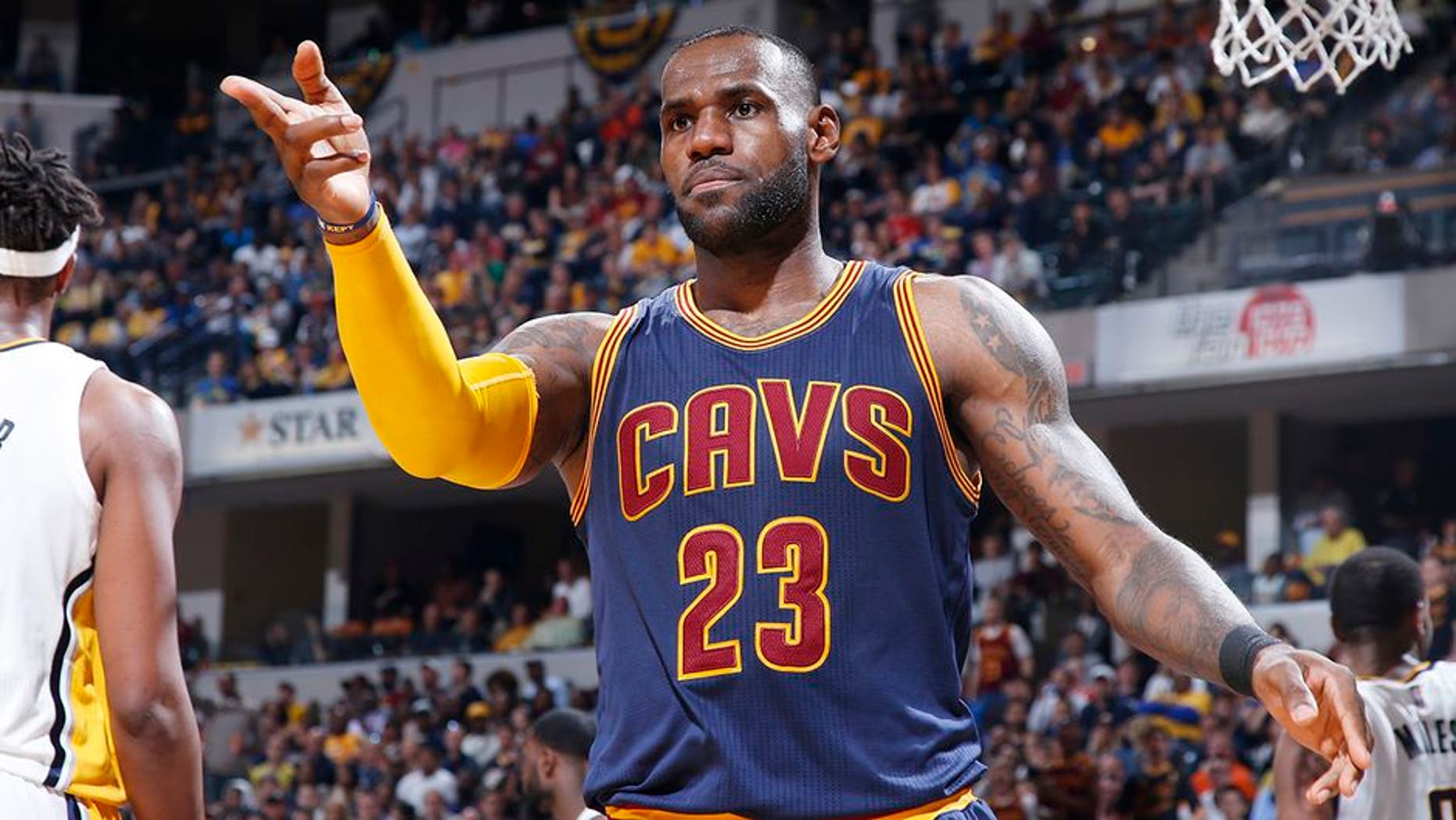 INDIANAPOLIS, IN - APRIL 23: LeBron James #23 of the Cleveland Cavaliers reacts after a basket and foul against the Indiana Pacers in the second half of Game Four of the Eastern Conference Quarterfinals during the 2017 NBA Playoffs against the Cleveland Cavaliers at Bankers Life Fieldhouse on April 23, 2017 in Indianapolis, Indiana. The Cavaliers defeated the Pacers 106-102 to sweep the series 4-0. NOTE TO USER: User expressly acknowledges and agrees that, by downloading and or using the photograph, User is consenting to the terms and conditions of the Getty Images License Agreement. (Photo by Joe Robbins/Getty Images)