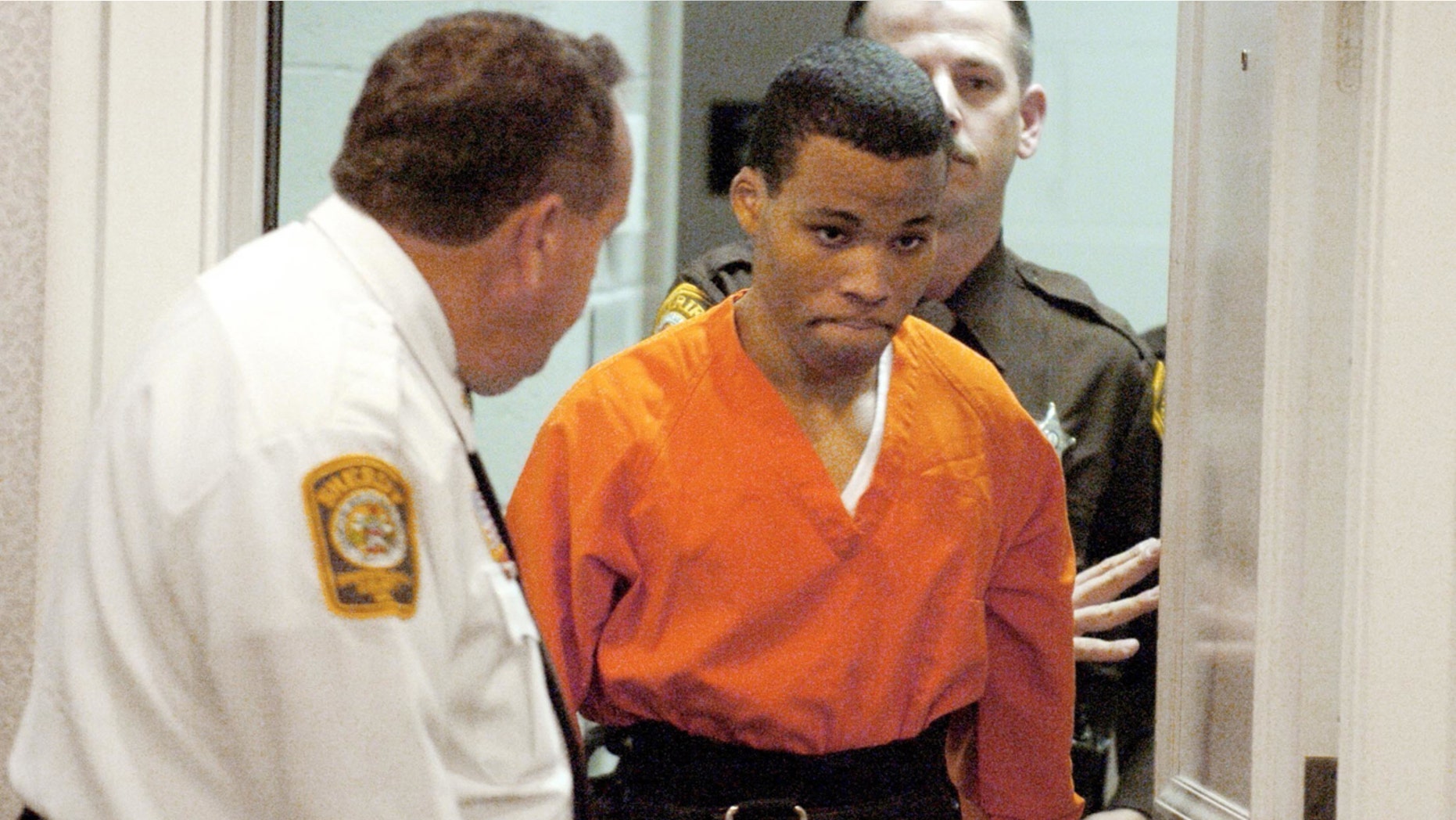 In this Oct. 26, 2004, file photo, Lee Boyd Malvo enters a courtroom in the Spotsylvania, Va., Circuit Court.