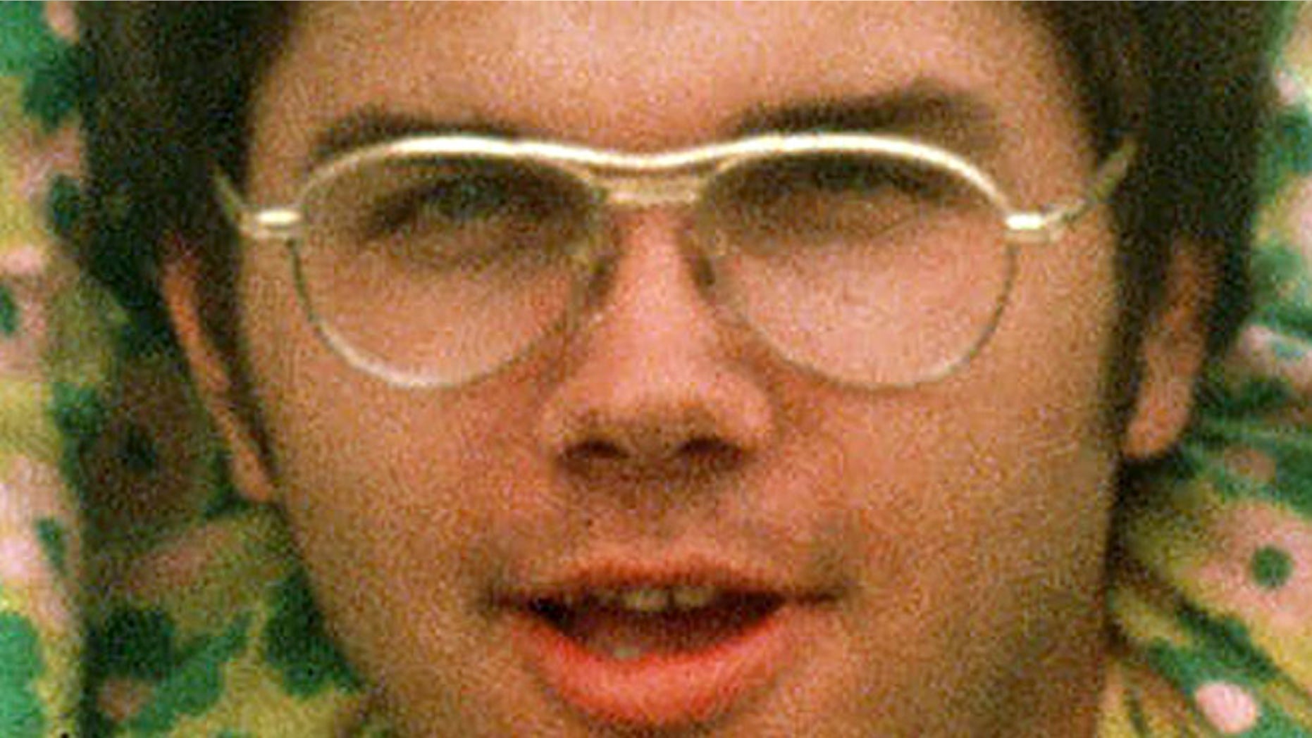 In this 1975 file photo, Mark David Chapman is seen at Fort Chaffee near Fort Smith, Ark.